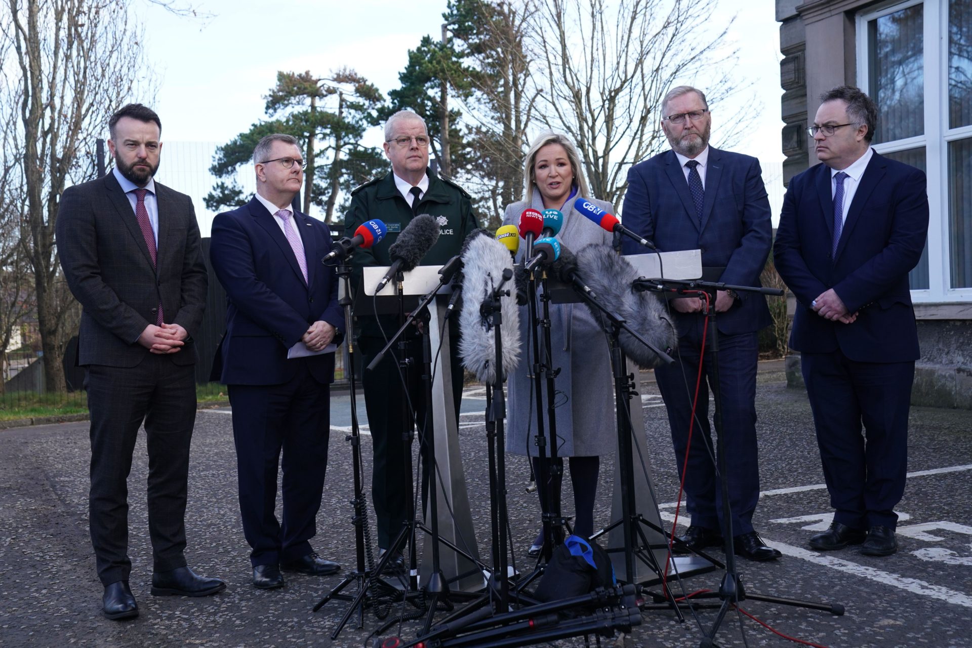 (Left to right) SDLP leader Colum Eastwood, DUP leader Jeffrey Donaldson, PSNI Chief Constable Simon Byrne, Sinn Fein deputy leader Michelle O'Neill, UUP leader Doug Beattie, and Alliance party member Stephen Farry speaking to the media outside PSNI HQ in Belfast, Northern Ireland. 