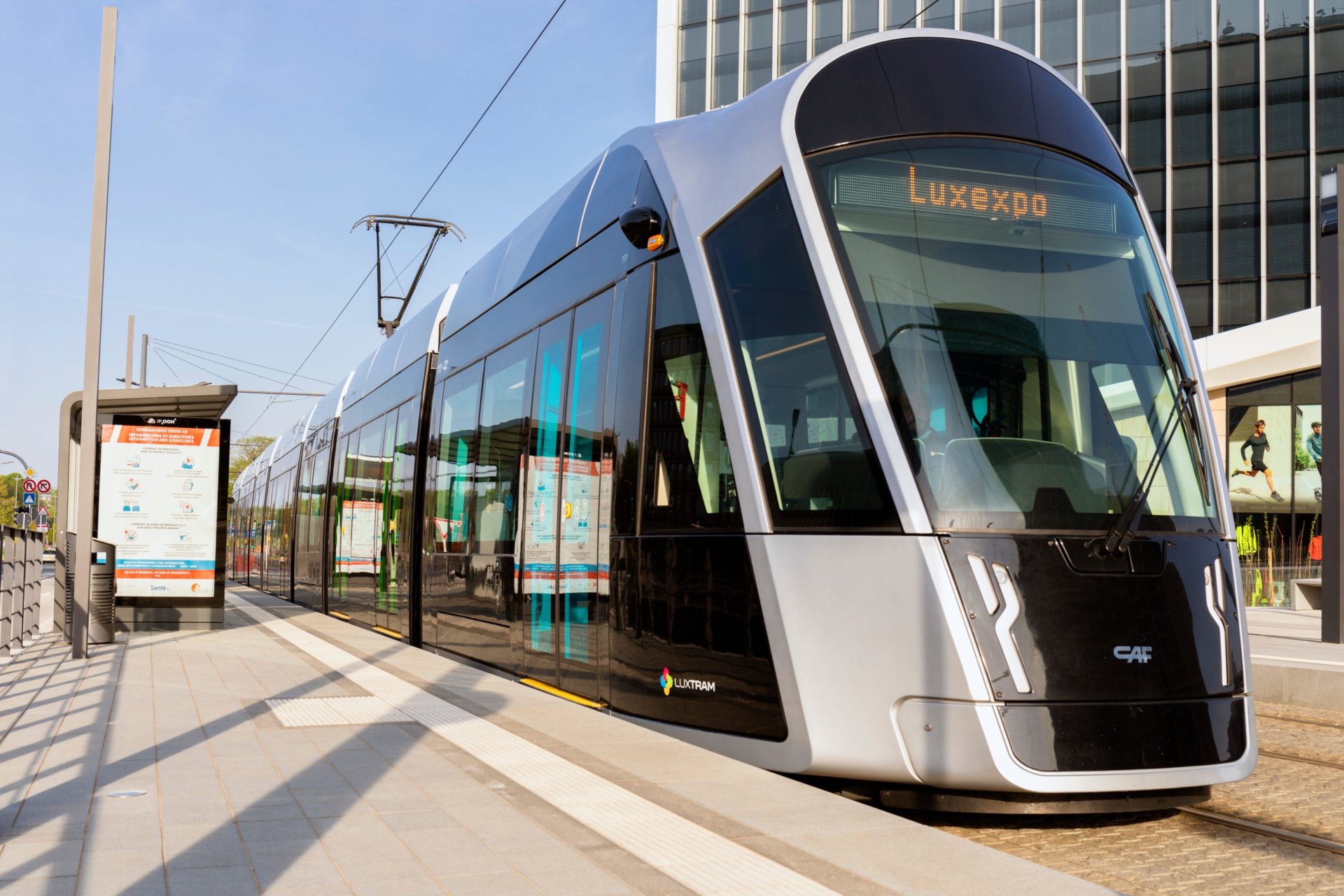 A tram pulling up at the Philharmonie - Mudam stop in Luxembourg City, Luxembourg in April 2020.