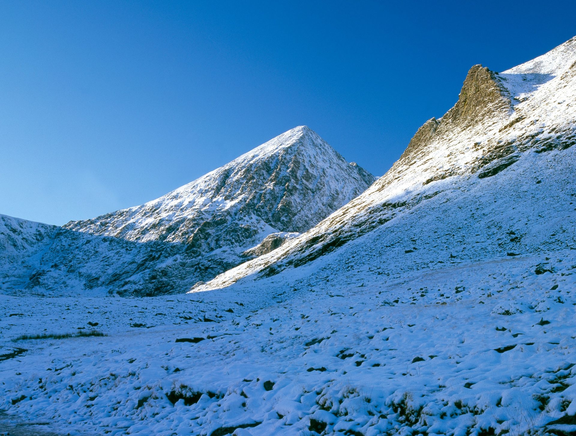 Ireland's highest mountain range, Carrauntoohil, covered in winter snow.