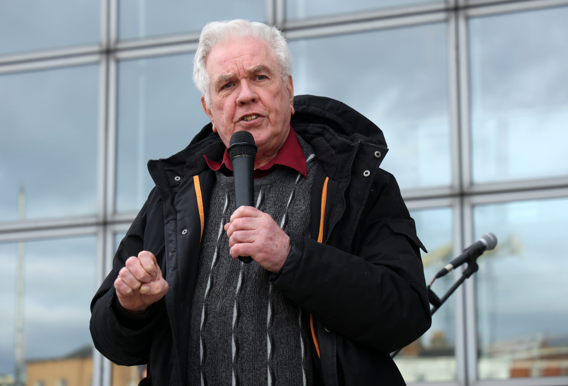 Fr Peter McVerry speaking to protesters facing eviction from Tierney House protesting outside Dublin County Council offices on Wood Quay