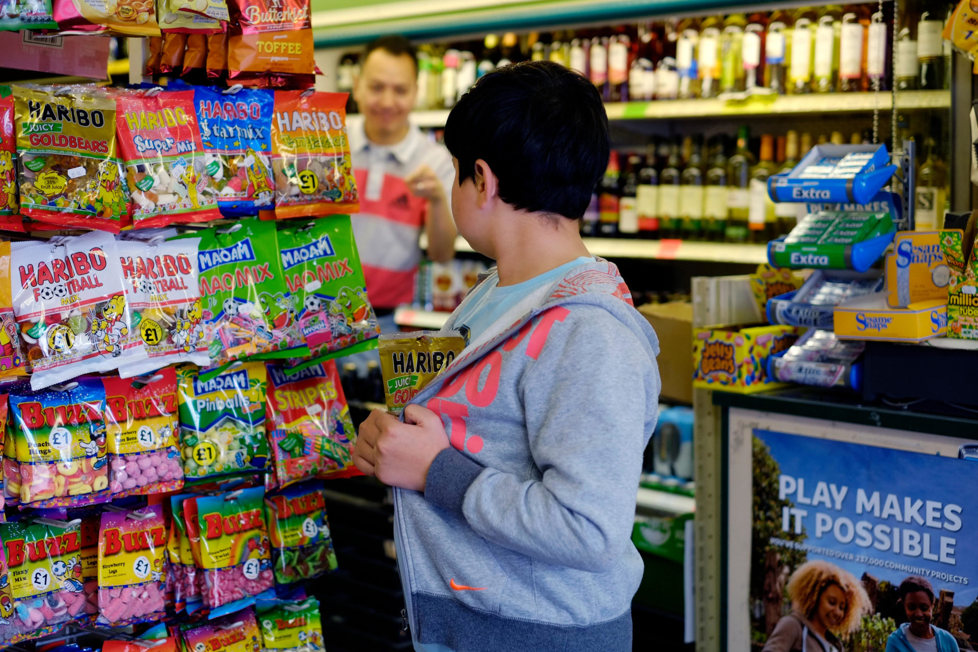 Young boy shoplifting