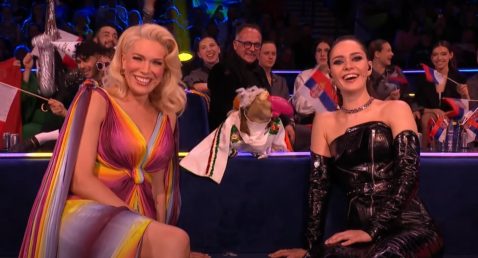 Dustin the Turkey appears alongside Eurovision hosts in Liverpool, England.