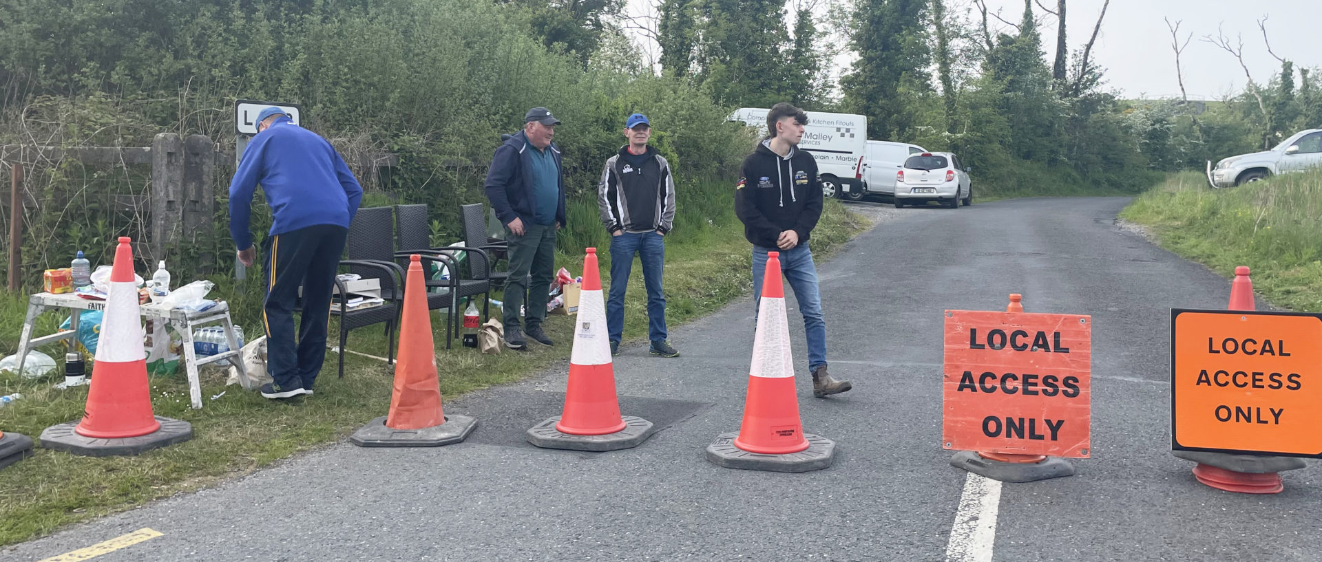 Clare, Ireland. Pictured are locals opposing the placement on duty manning a roadblock on Wednesday evening at the entrance to the road to the Magowna House Hotel and guest homes in Co. Clare. Locals have protested after refugees were housed here.