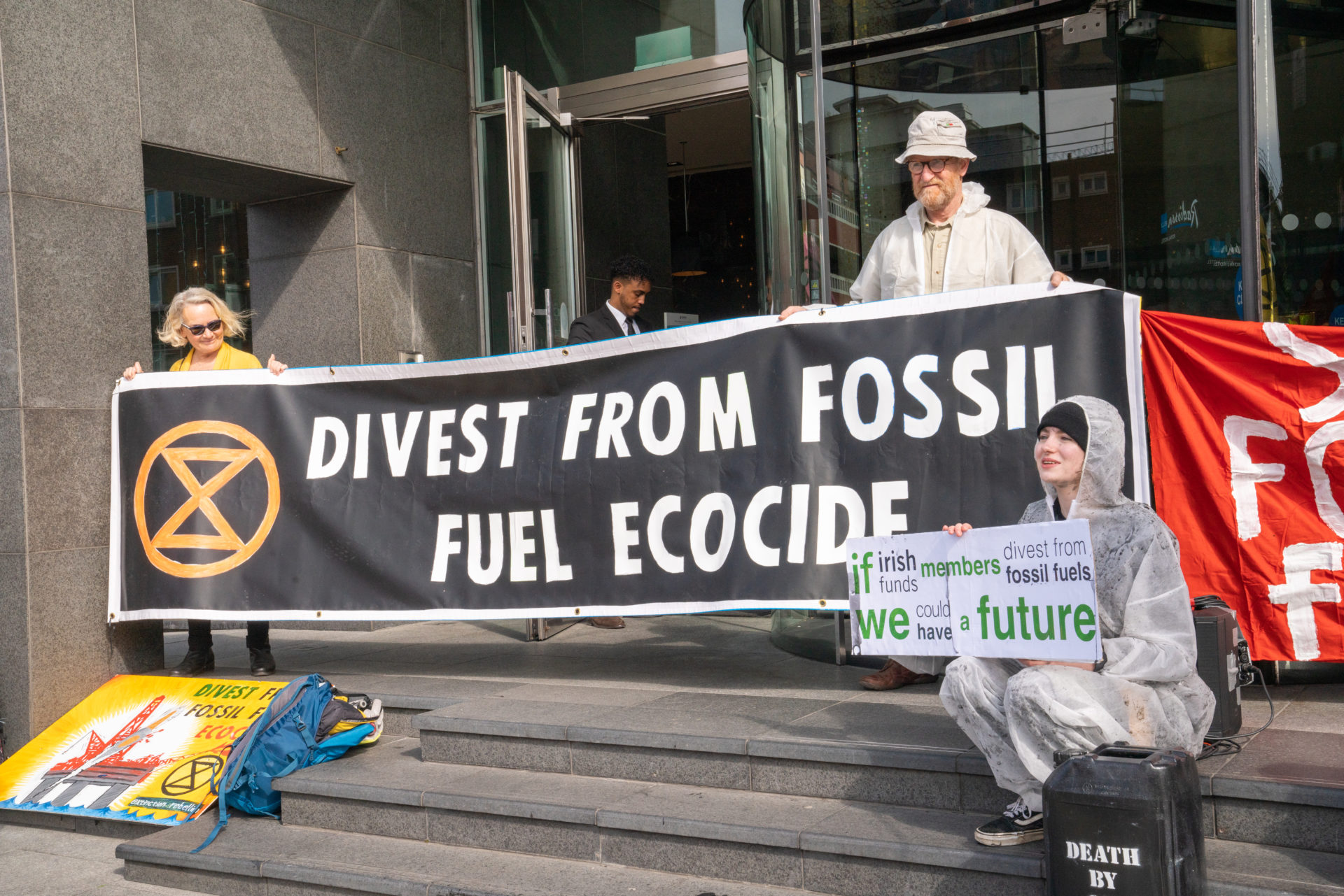 Extinction Rebellion is holding a “die in” protest outside a finance conference in Dublin. (Photos by Tom Douglas)