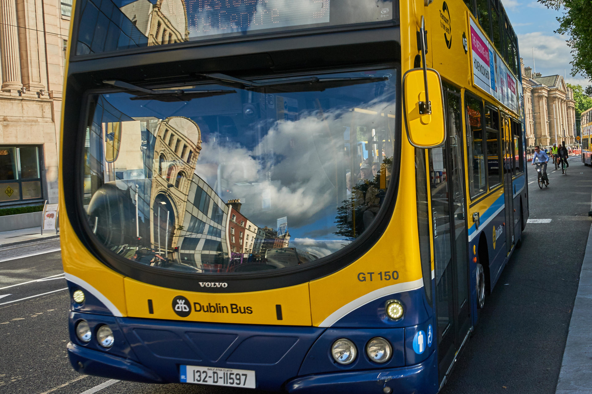 Blue and yellow double decker bus in Dublin city centre