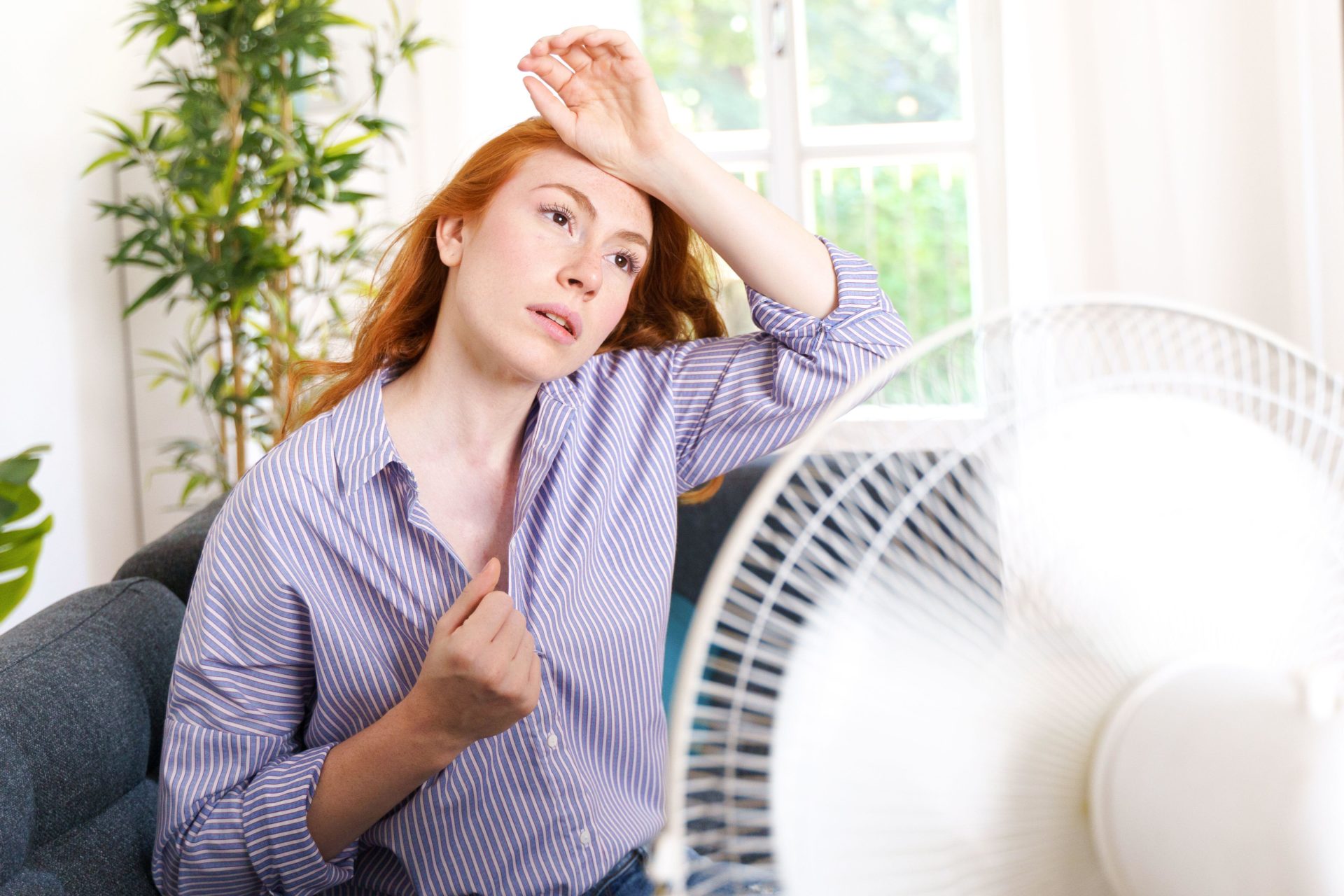 One woman suffers from heat in the summer season