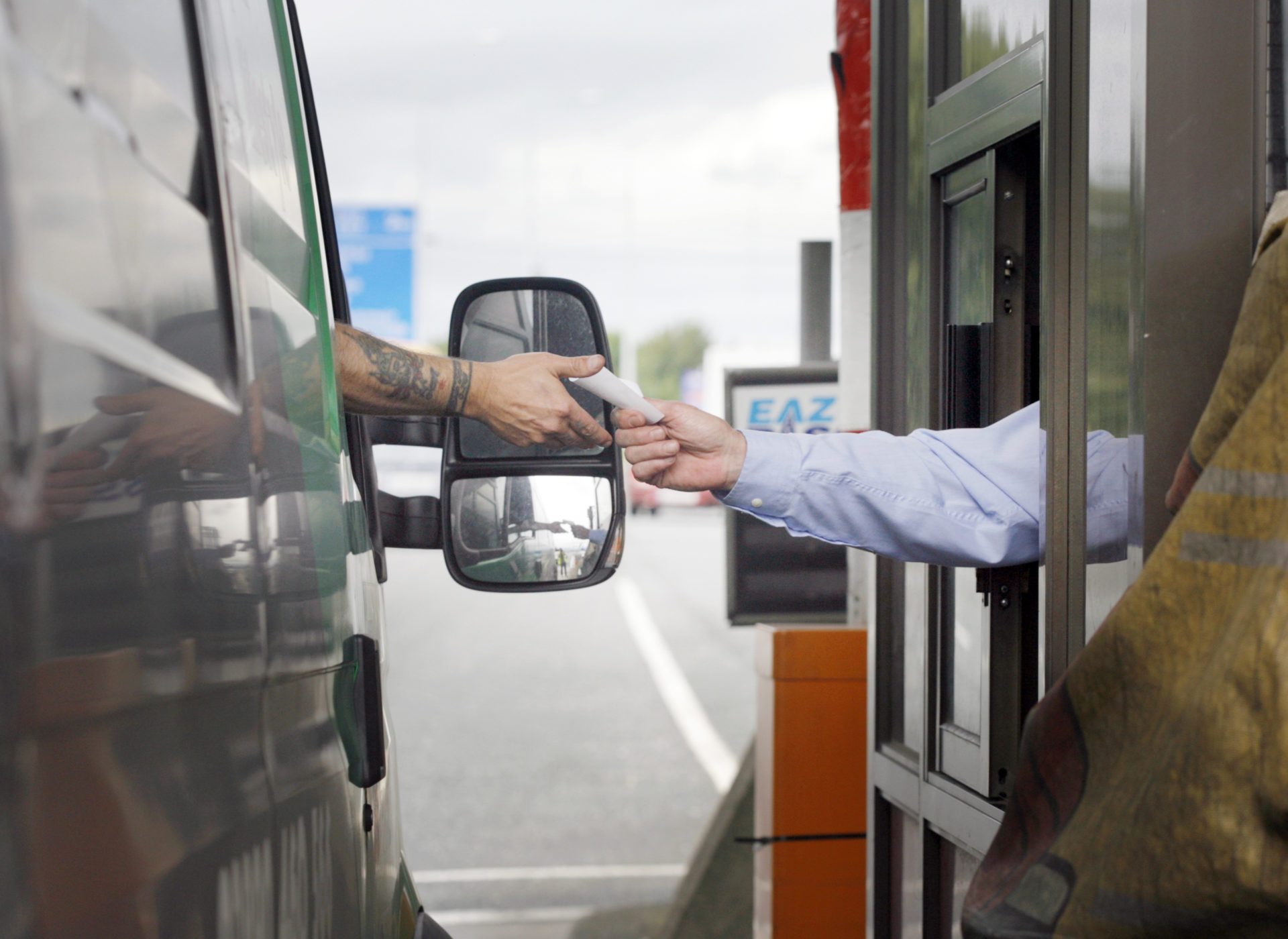 A driver pays at a toll plaza. Image: Mark Stedman/Photocall Ireland.