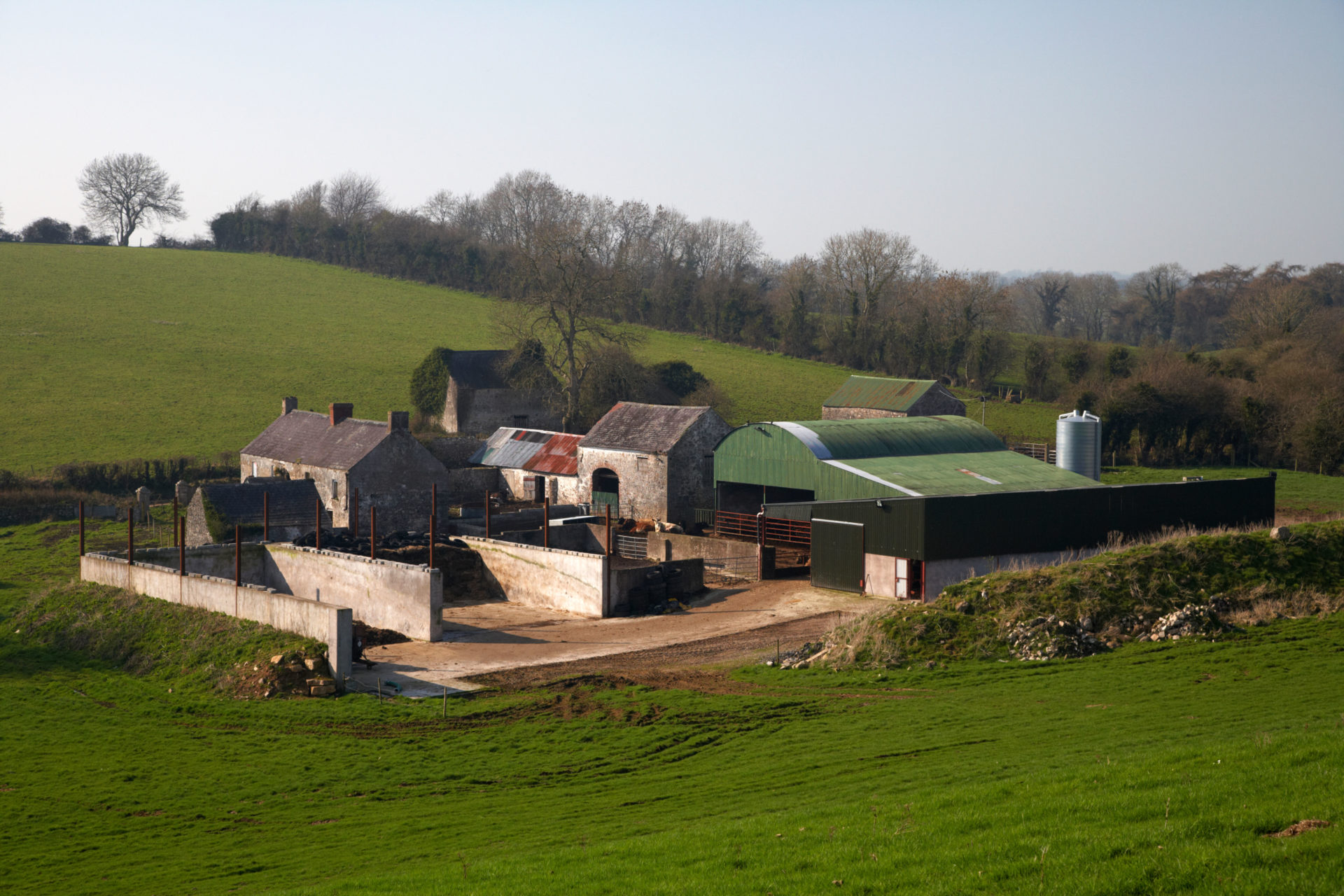 Small enclosed Irish farm in the countryside.