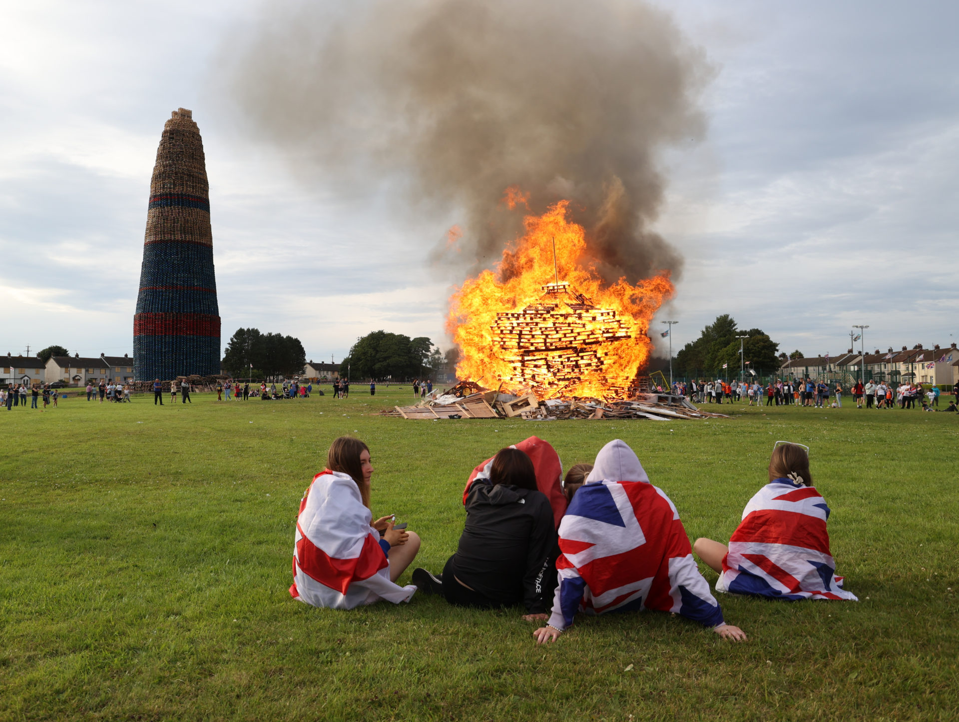 12th Of July Bonfires Pictured children drapped in British flags beside a small fire near the Larne bonfire which is the tallest bonfire in Northern Ireland, 