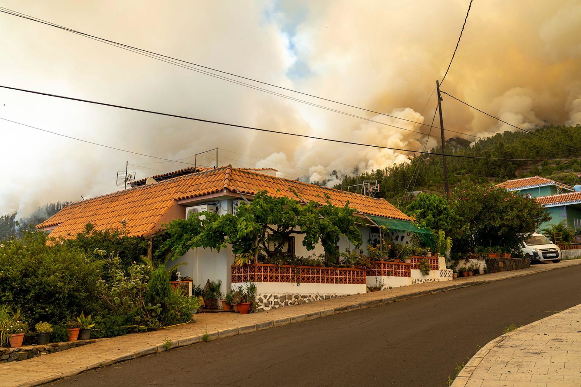 View of the fire approaching an evacuated population centre in Puntagorda, La Palma, Canary Islands in Spain