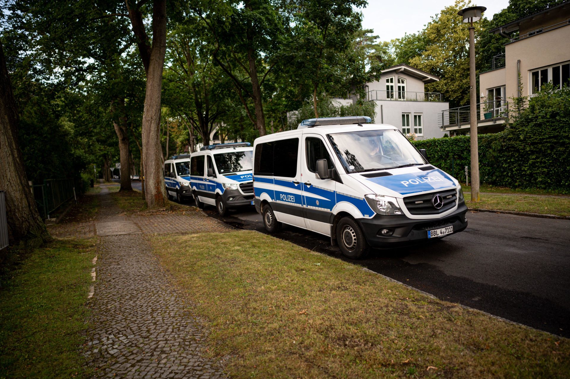 Police cars are parked in a residential area in Berlin, Germany during the search for wild animal believed to be a lioness. 