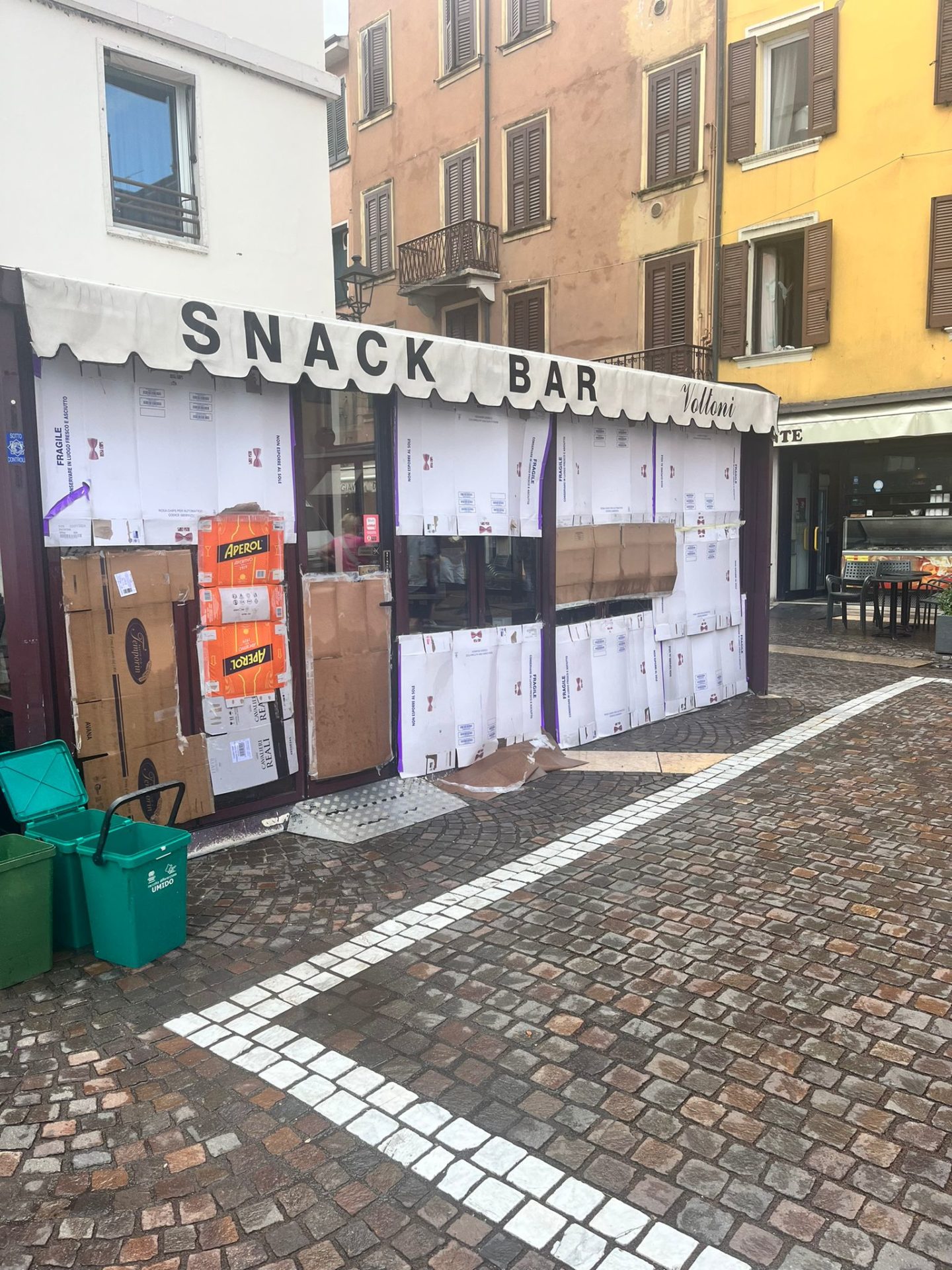 Boarded up bar in Peschiera, Lake Garda after hailstorm (Photo by Gráinne Smyth)