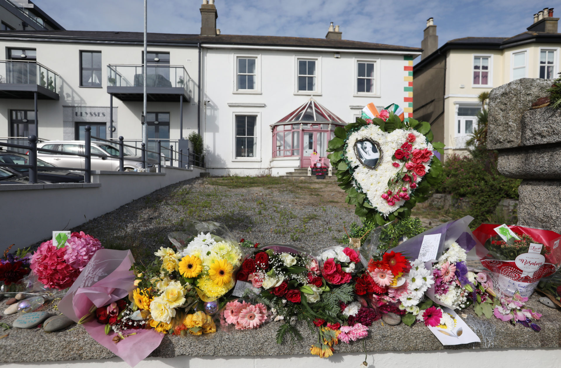A huge crowd gathers outside Sinéad O’Connor's former home in Bray on the morning of her funeral
