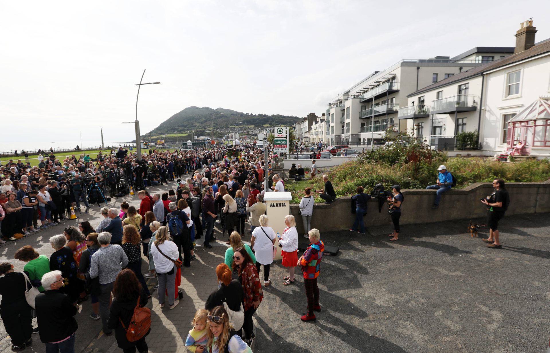A huge crowd gathers outside Sinead O’Connor's former home in Bray on the morning of her funeral