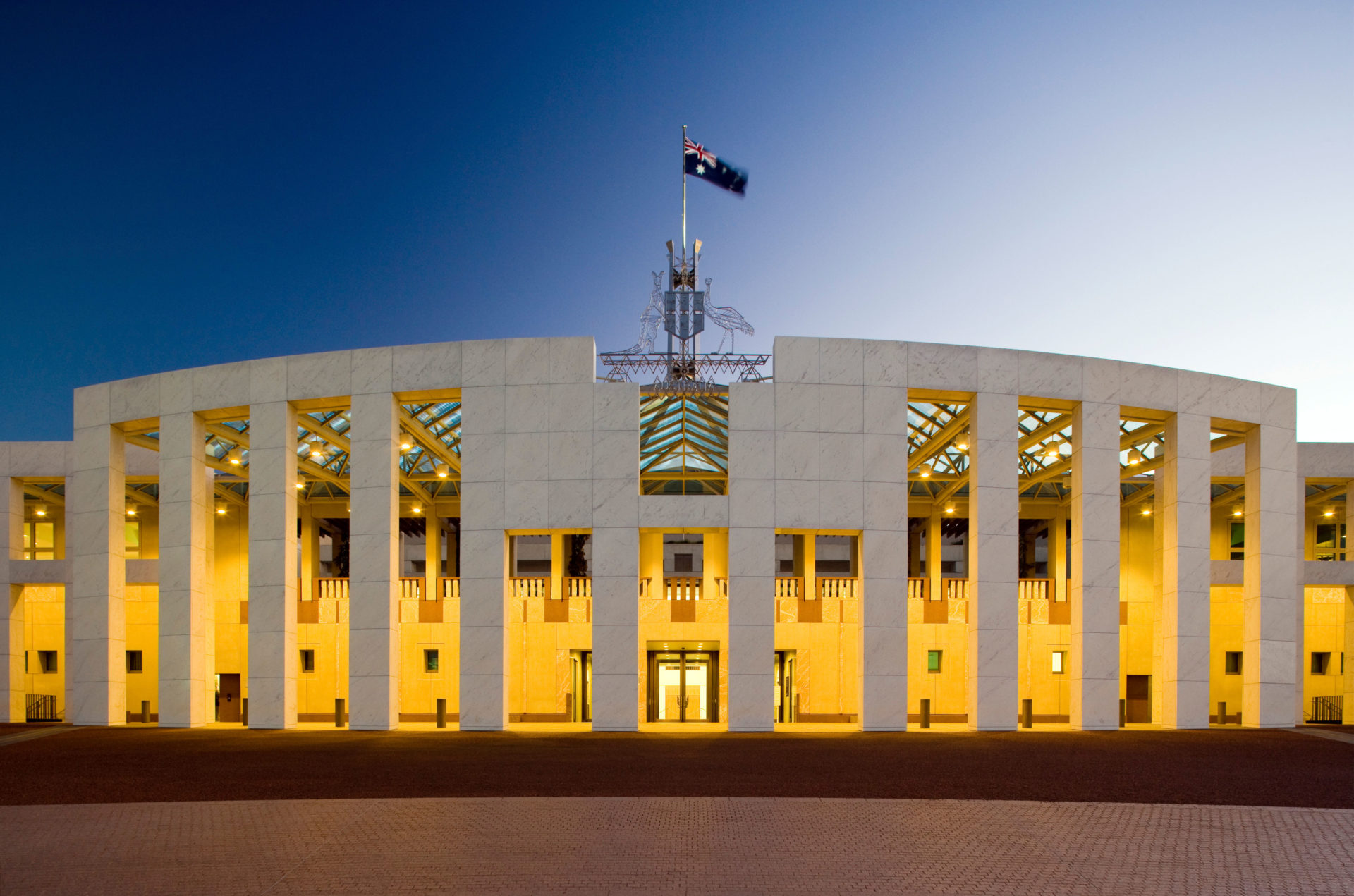 The Australian flag flies above Parliament of Australia in Canberra in April 2008