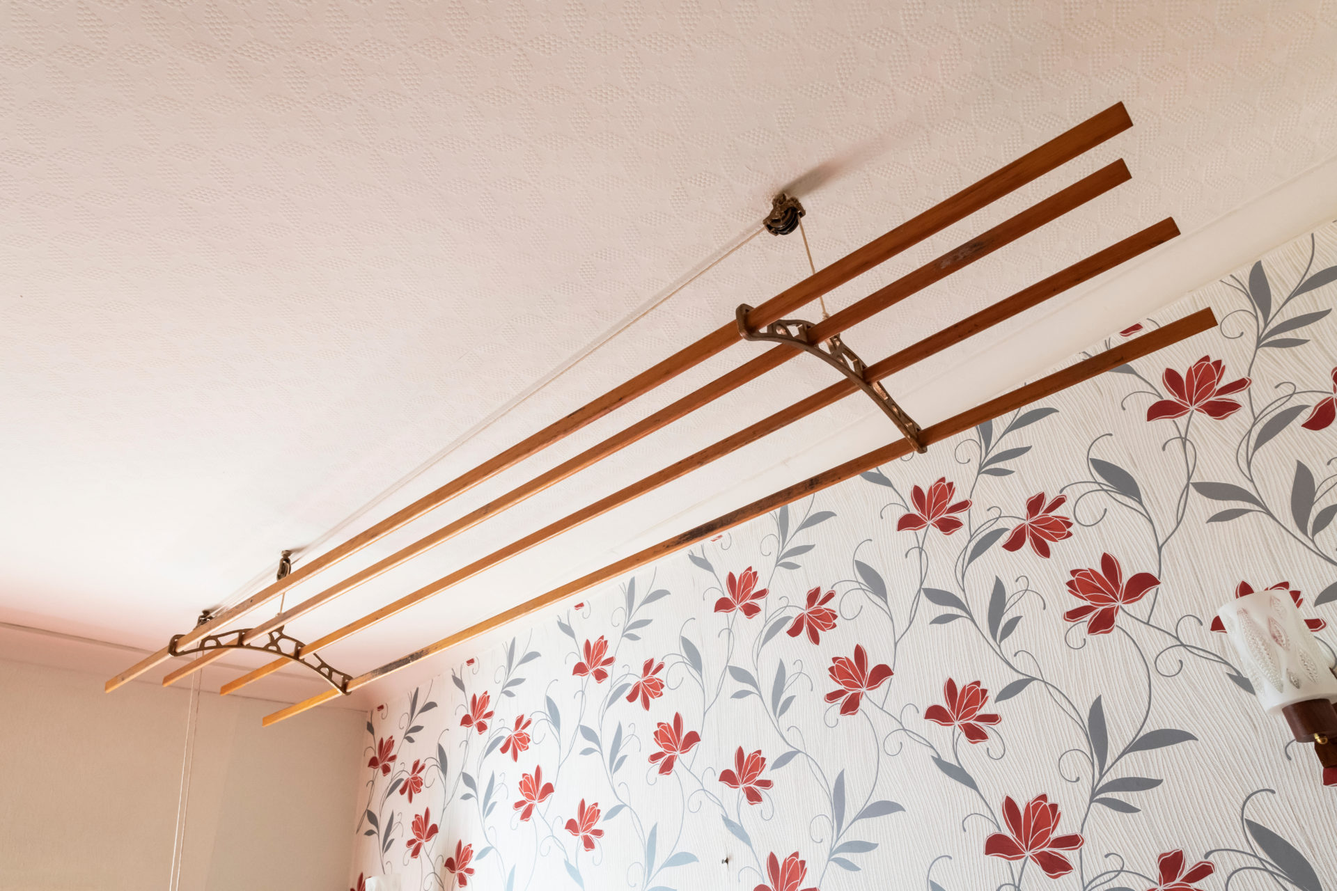 An old-fashioned Sheila Maid (clothes airer) in a terraced house.