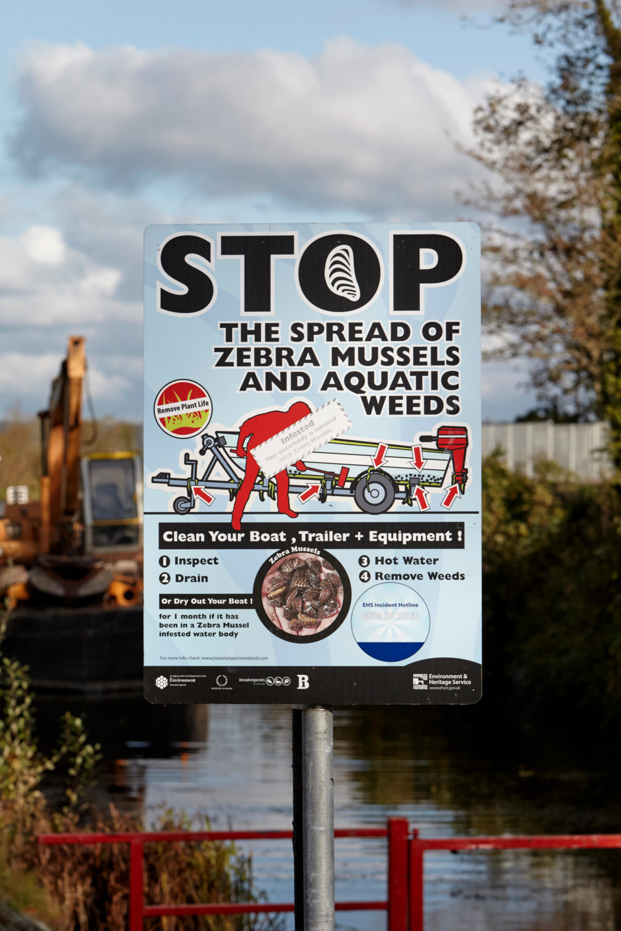 Warning sign about the spread of zebra mussels at Ballyronan marina, Lough Neagh, Derry 