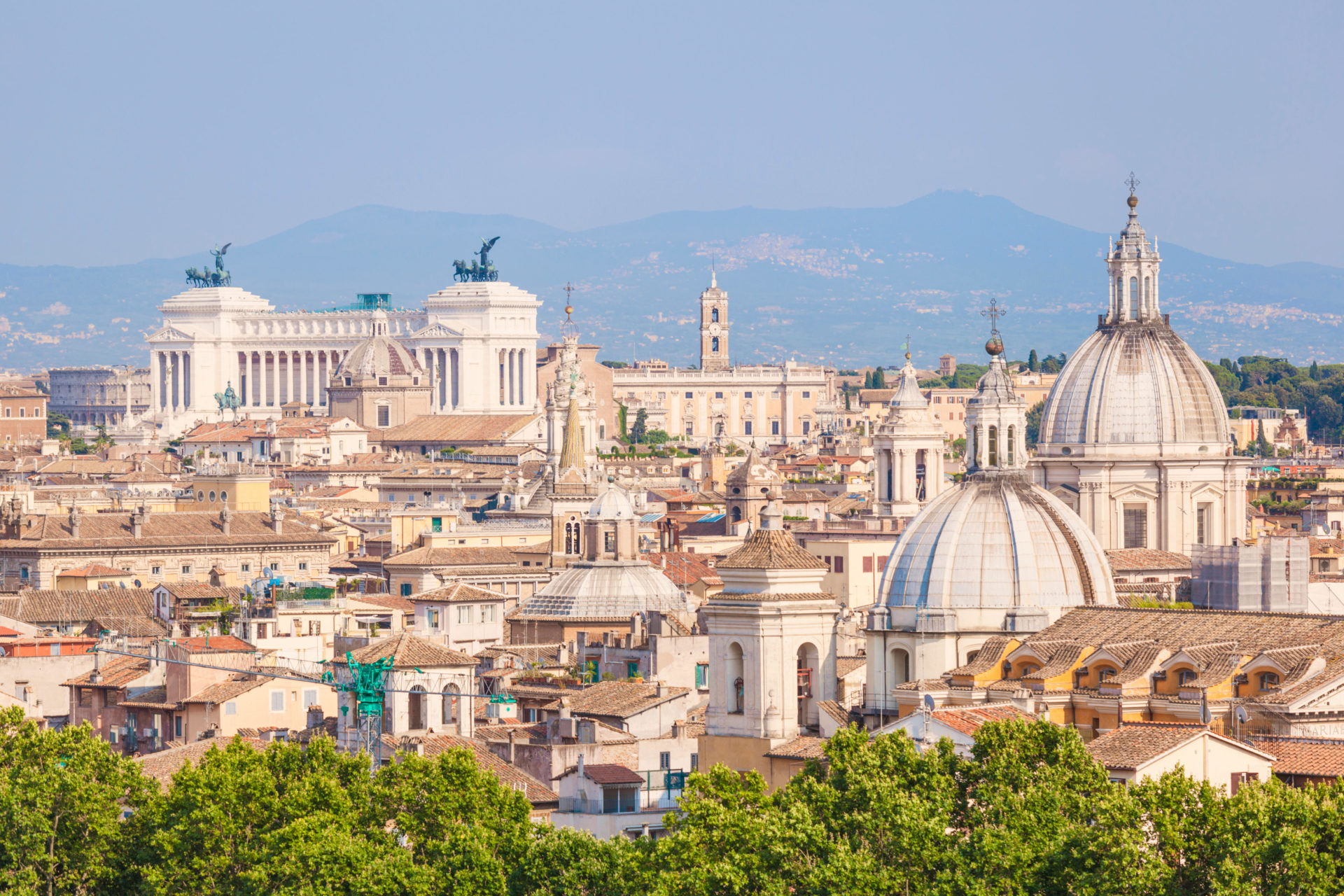 Churches and domes of the Rome skyline in Italy in July 2015.