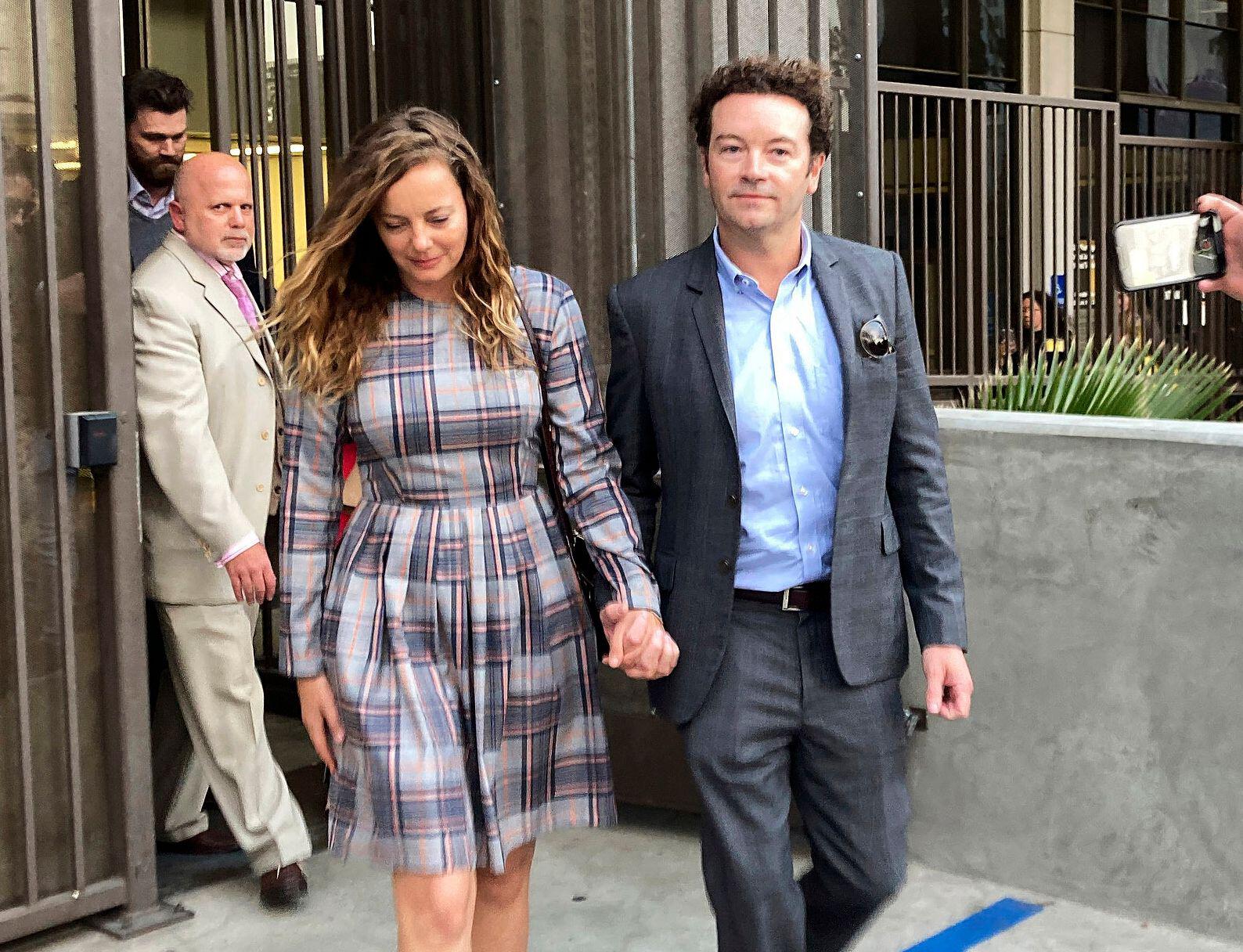 Actor Danny Masterson leaves Los Angeles superior Court with his wife Bijou Phillips after a judge declared a mistrial in his rape case in Los Angeles