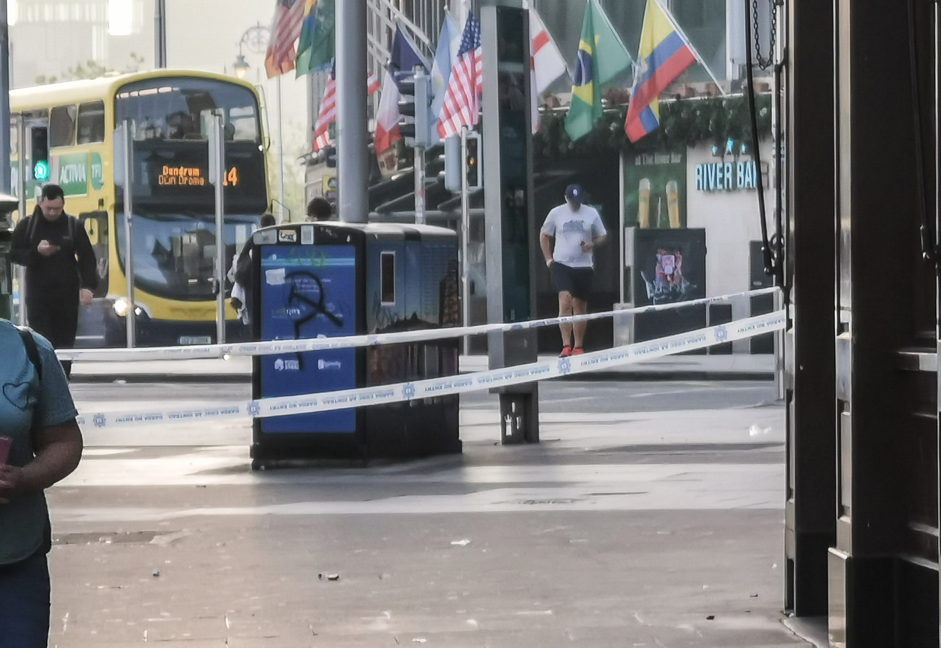 Gardaí at the scene of a serious assault on Aston Quay in Dublin City Centre