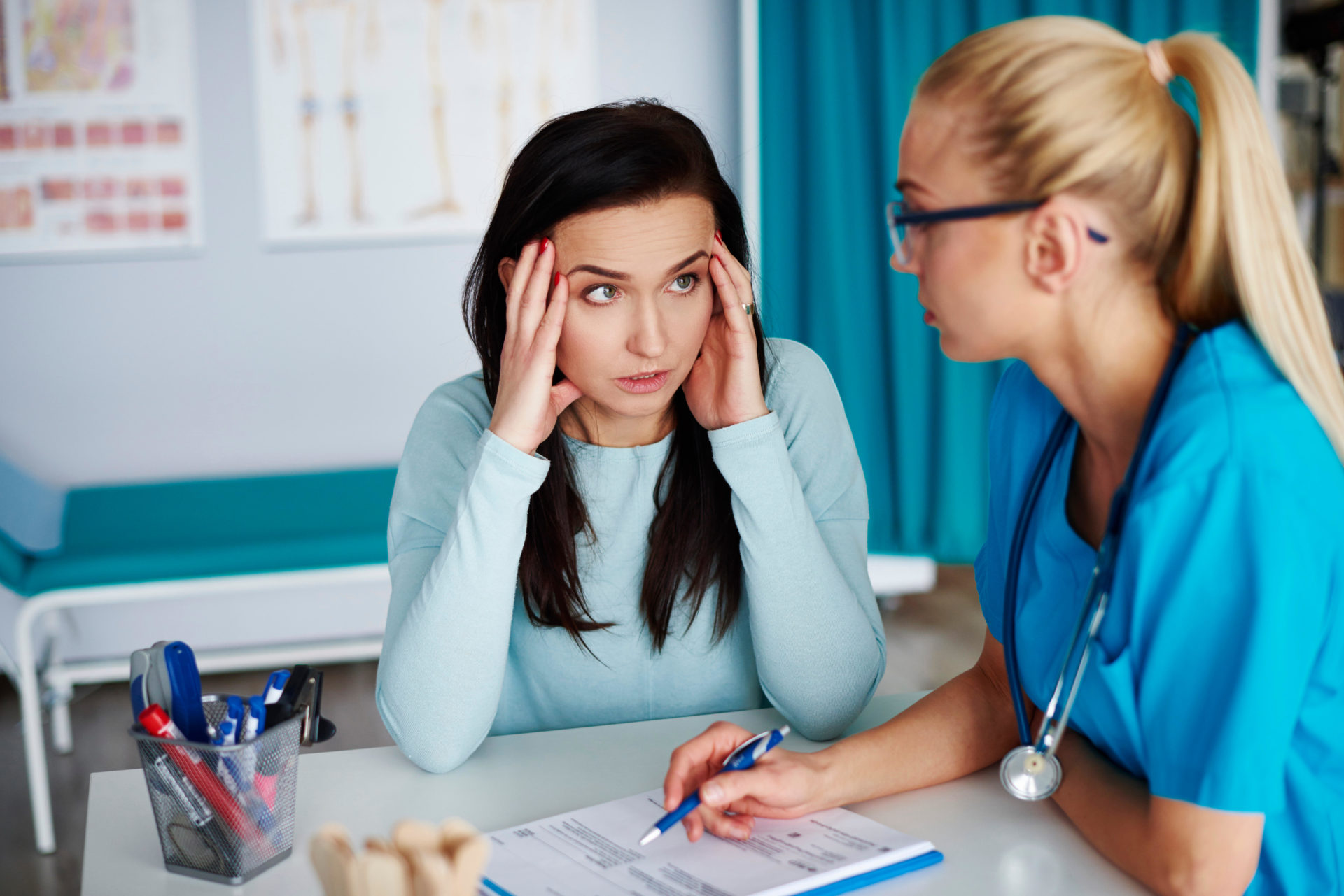 Woman talking to doctor (Westend61 GmbH / Alamy Stock Photo)