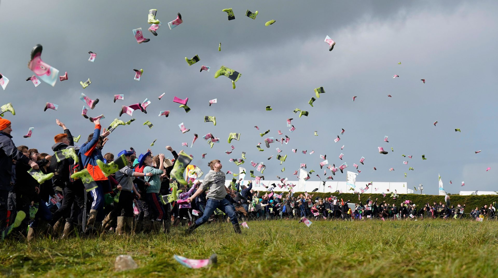 People take part in a Guinness World Record attempt at the most people throwing wellies on day two of the National Ploughing Championships at Ratheniska, Co Laois, 20-9-23