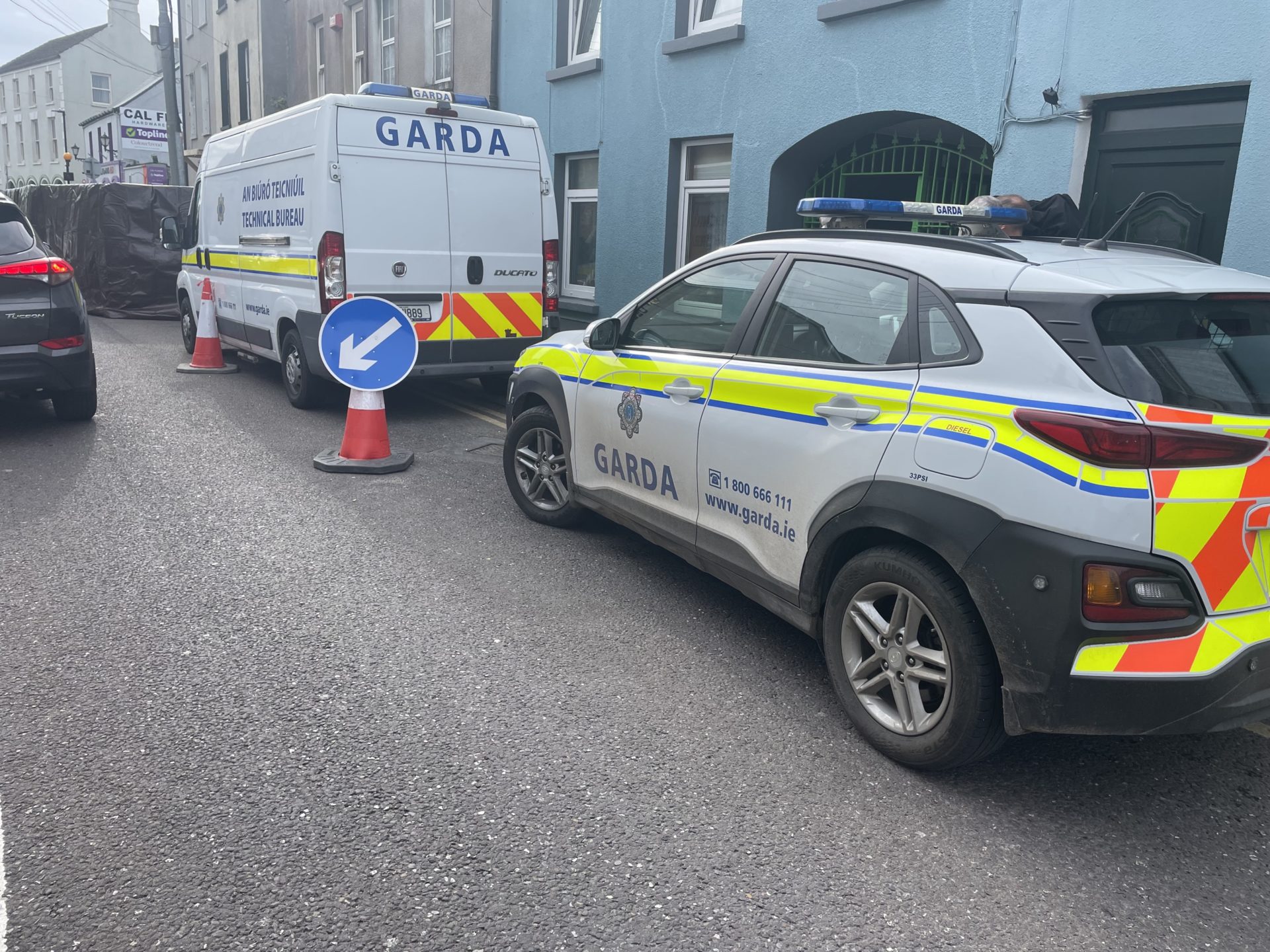 Gardaí outside the house where Tina Satchwell lived in Youghal, County Cork. Image: Jamie O’Hara/Newstalk