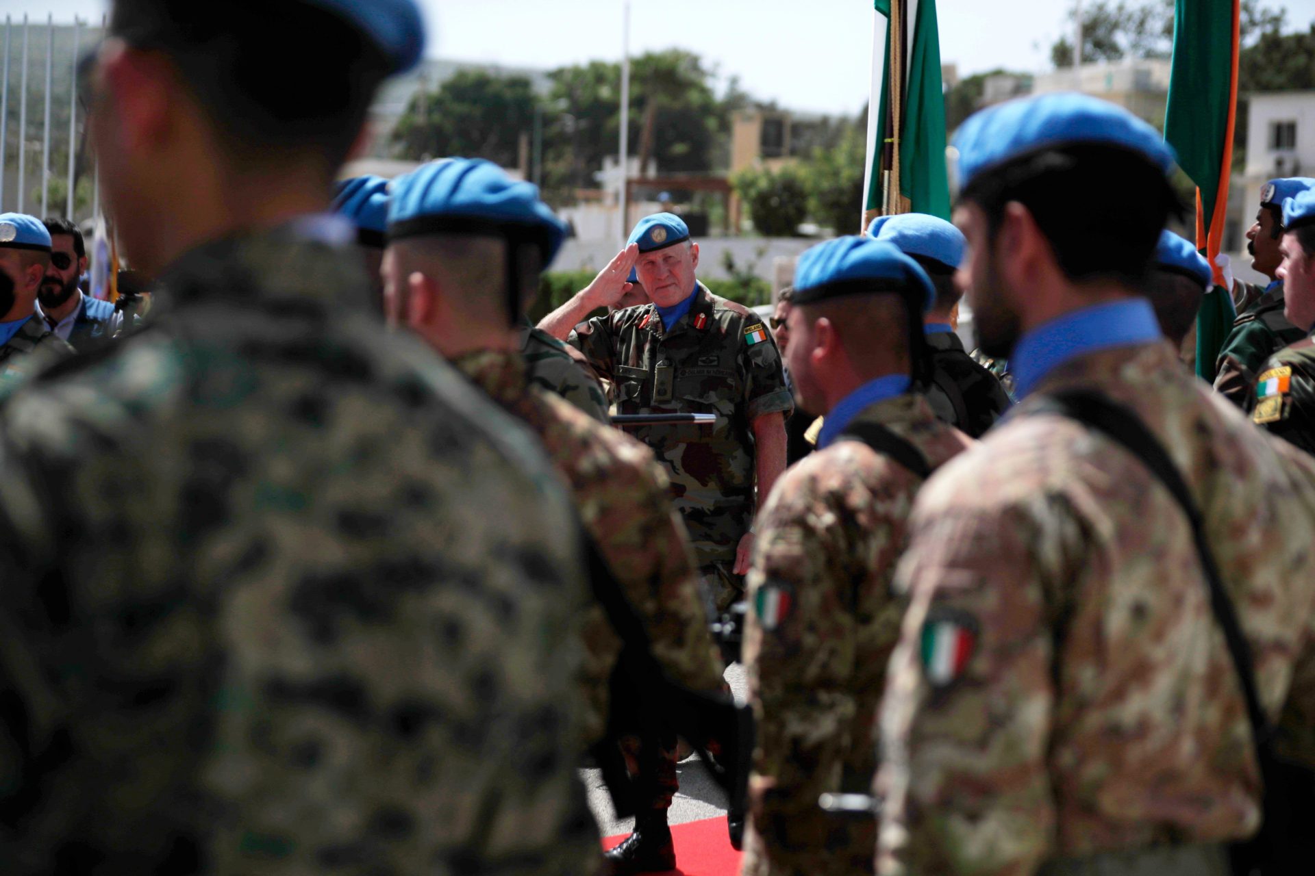 2MNMWA4 Head of Mission and Force Commander of the United Nations Interim Force in Lebanon (UNIFIL), Maj. Gen. Michael Beary of Ireland, center, reviews an honor guard of United Nations peacekeepers, on his arrival at their headquarters, during a ceremony to mark the 40th anniversary of UNIFIL's peacekeeping presence in southern Lebanon, in the coastal town of Naqoura, Lebanon, Monday, March 19, 2018. (AP Photo/Hassan Ammar)