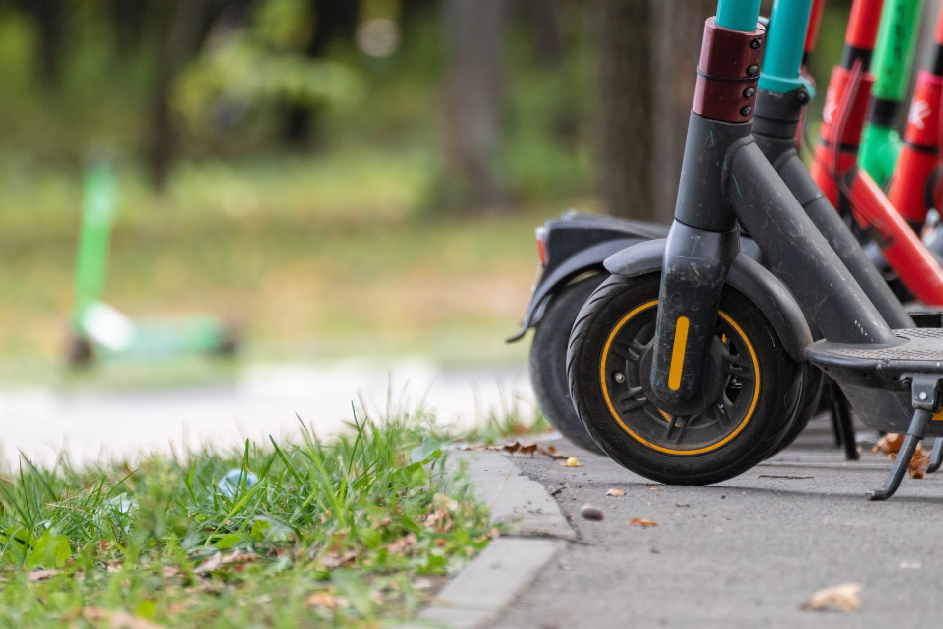 Electric Scooters in a city park.