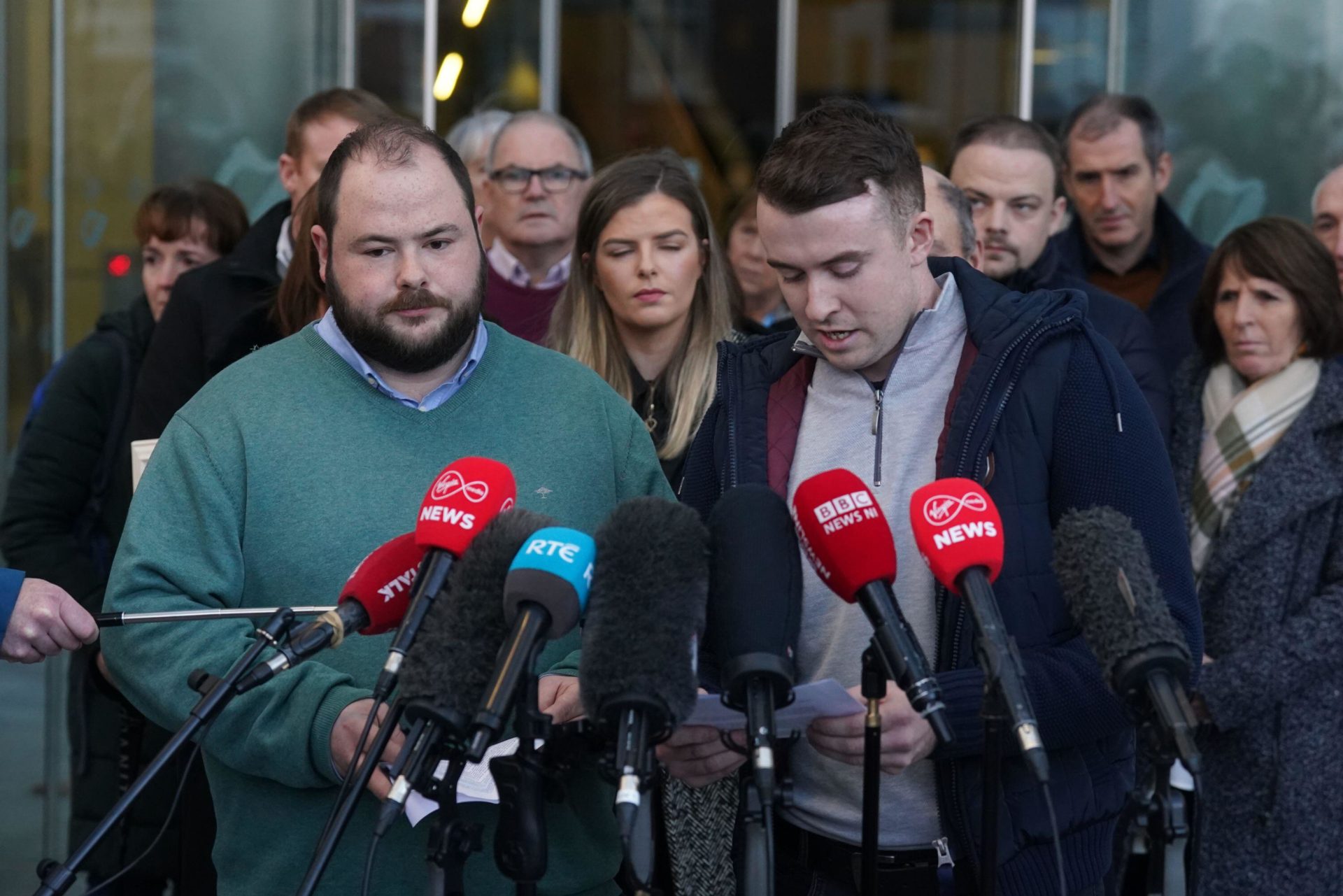 Ashling Murphy’s brother Cathal (left), sister Amy (centre) and boyfriend Ryan Casey (right), face the media after Jozef Puska was found guilty