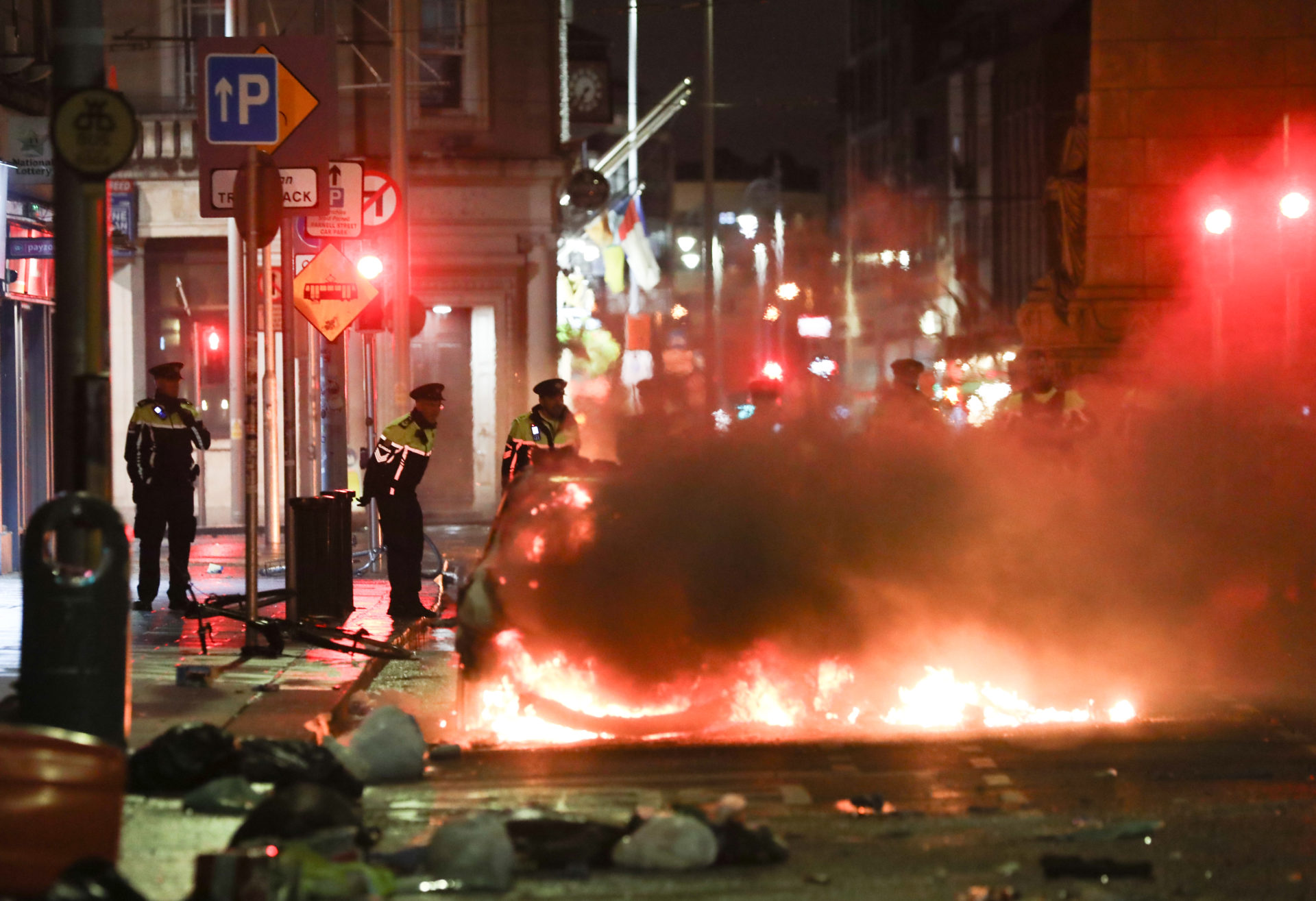 A car burns on Parnell Street as rioters cause chaos in Dublin city centre