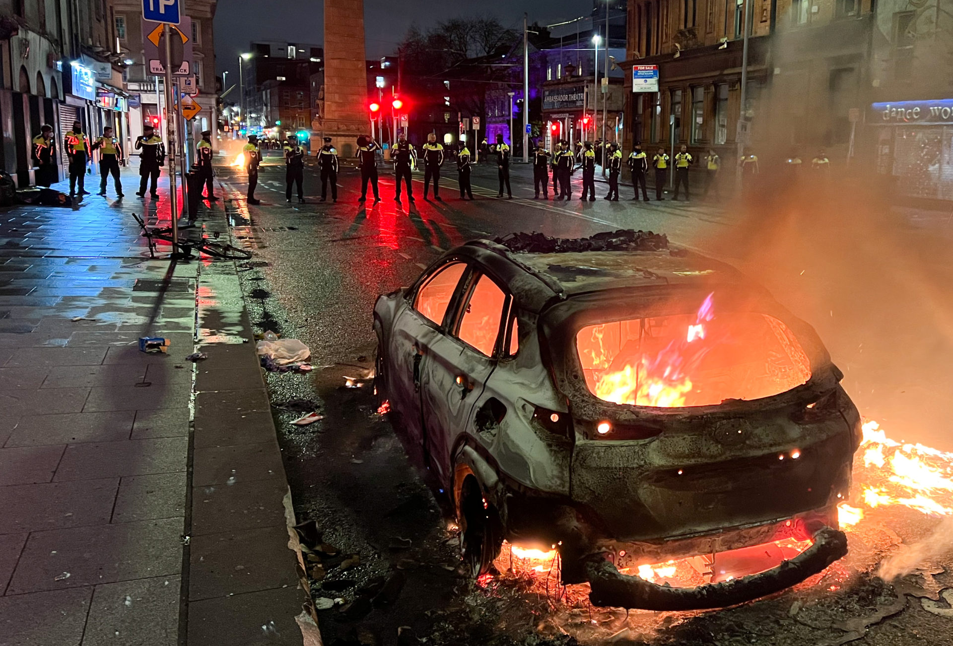 A car burns on Parnell Street as rioters cause chaos in Dublin city centre