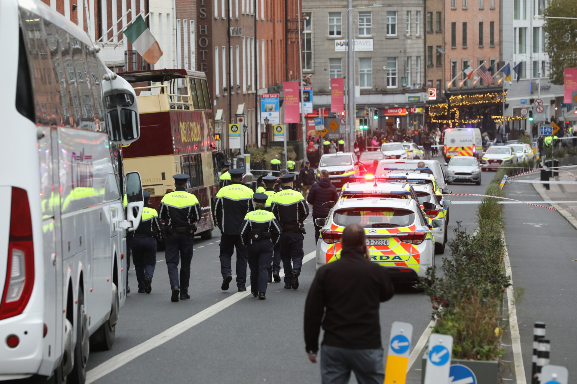 Gardaí at the scene where a teacher and three children were injured in a stabbing attack