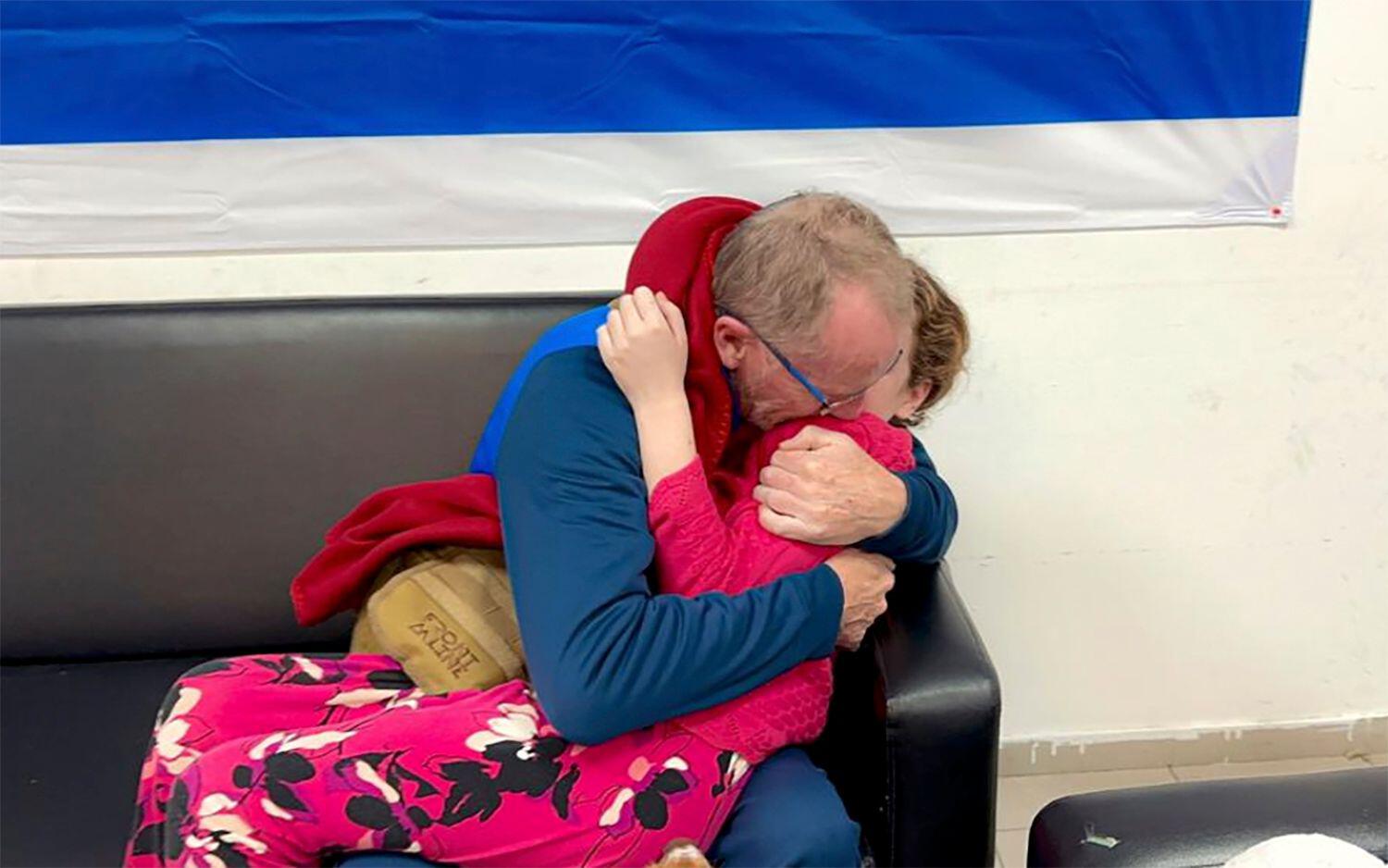 Emily Hand reunited with her father, Dublin-born Tom Hand, in an Israeli hospital, 25/11/2023. Image: AP/Alamy
