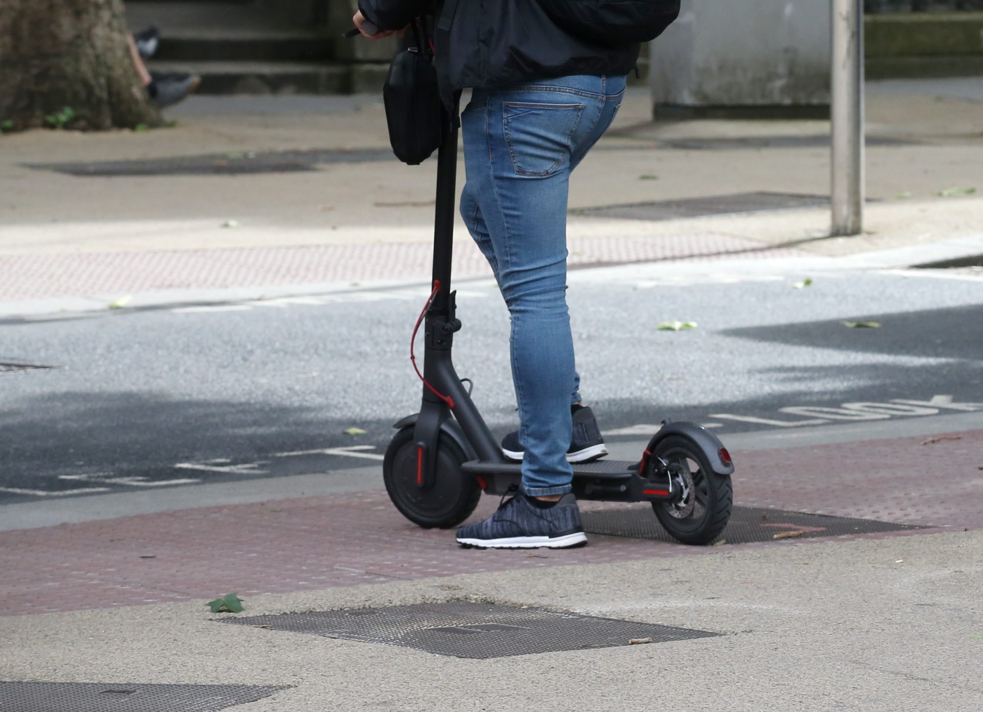 A person rides an e-scooter in Dublin city, 20/08/2020