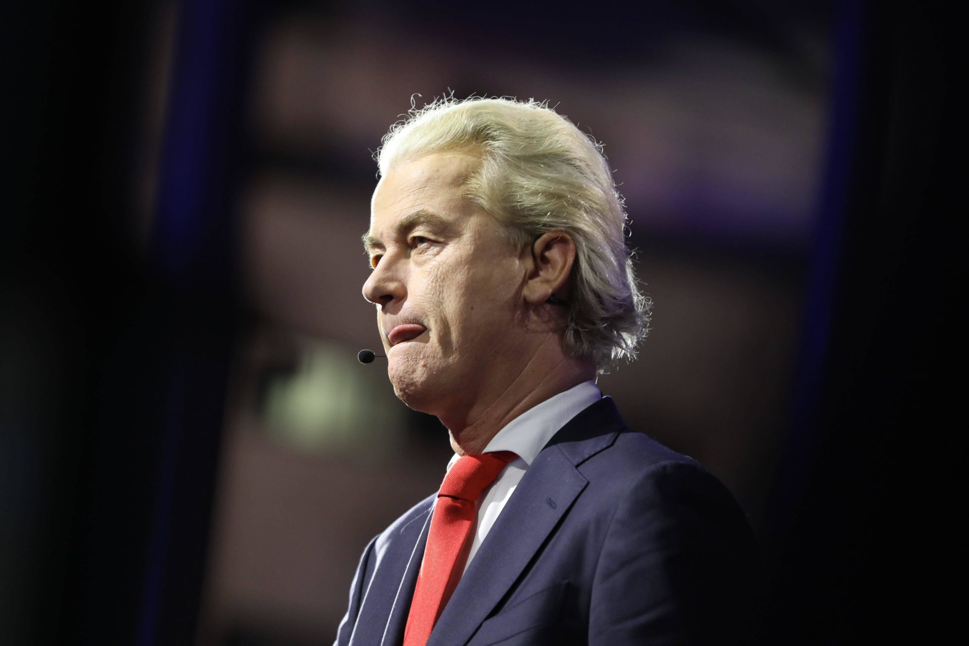 Geert Wilders takes part in a TV debate on the eve of election night