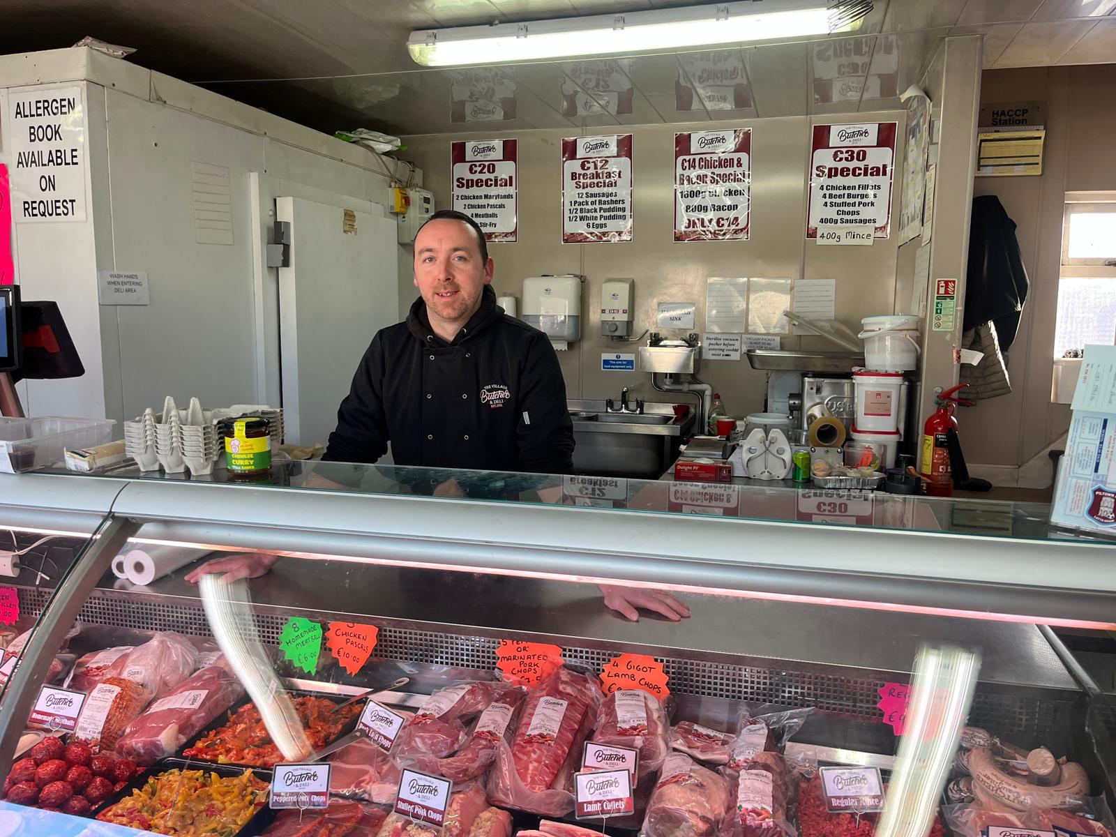 Butcher Stephen Power behind his counter