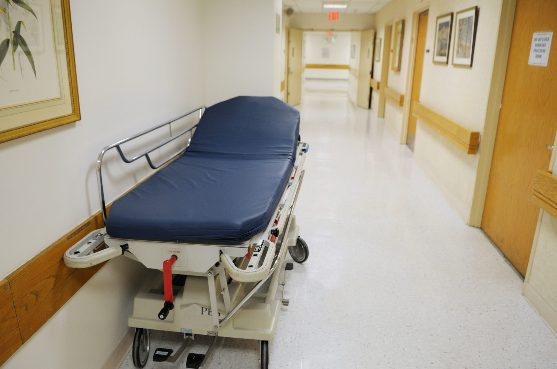 Hospital corridor with an empty trolley amid trolley crisis. Image: Martin Shields / Alamy Stock Photo