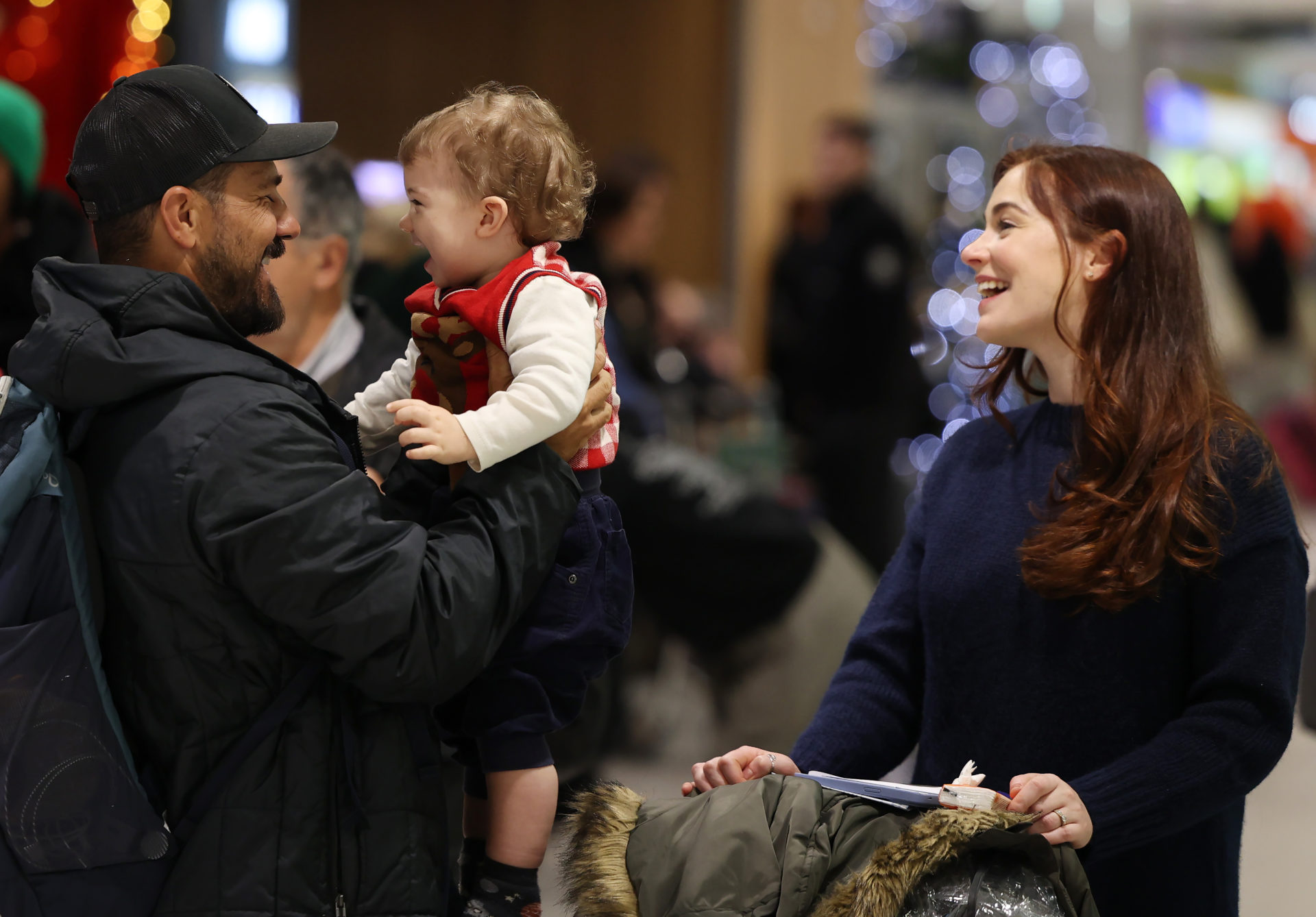 Adriano is welcomed home from Australia by his son Luca and wife Catherine from Co Antrim at Dublin Airport, 21/12/2023. Image: Sam Boal/Rollingnews.ie