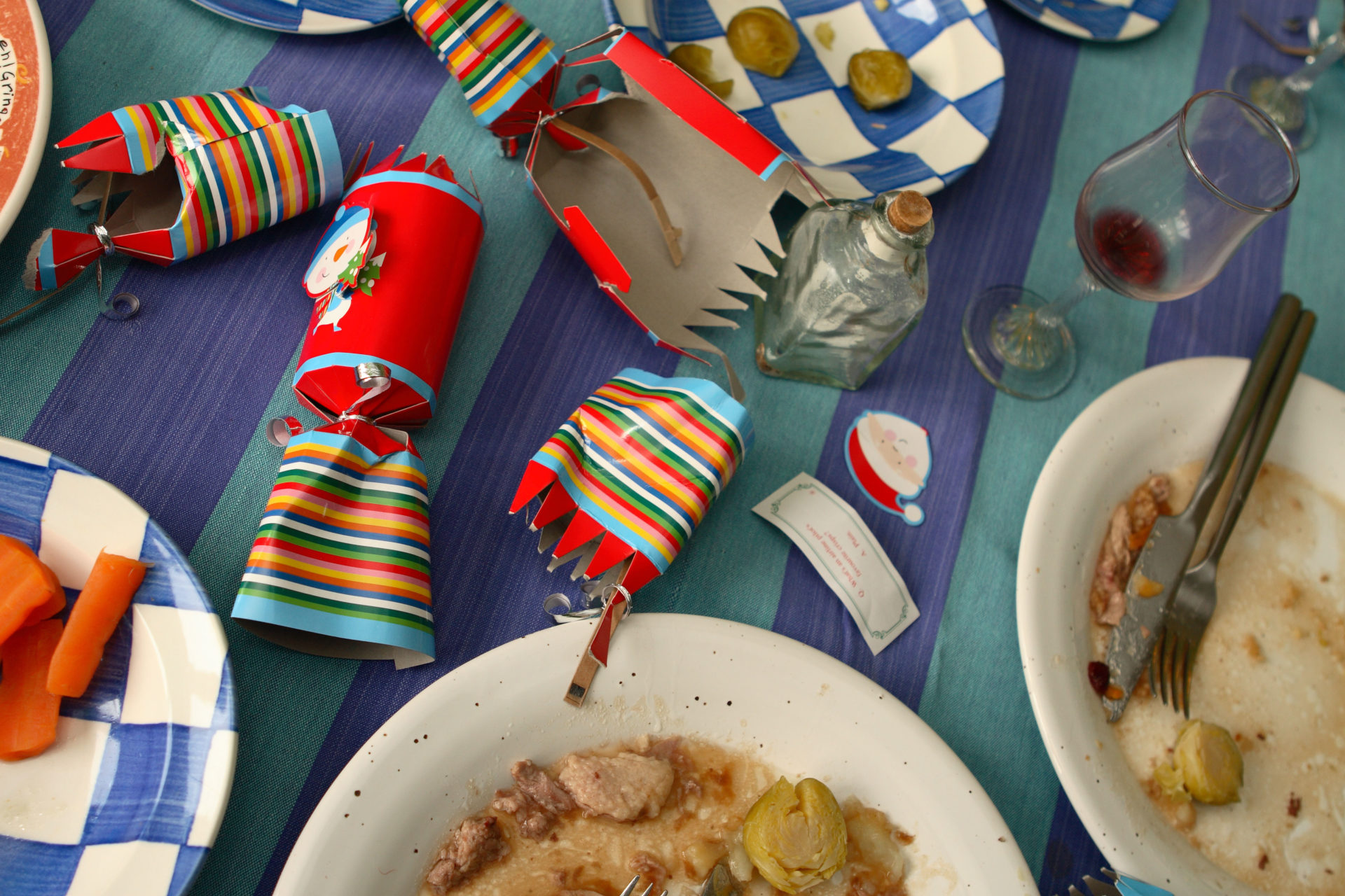 Christmas day dinner after the meal leftovers messy table. Image: Steven May / Alamy Stock Photo