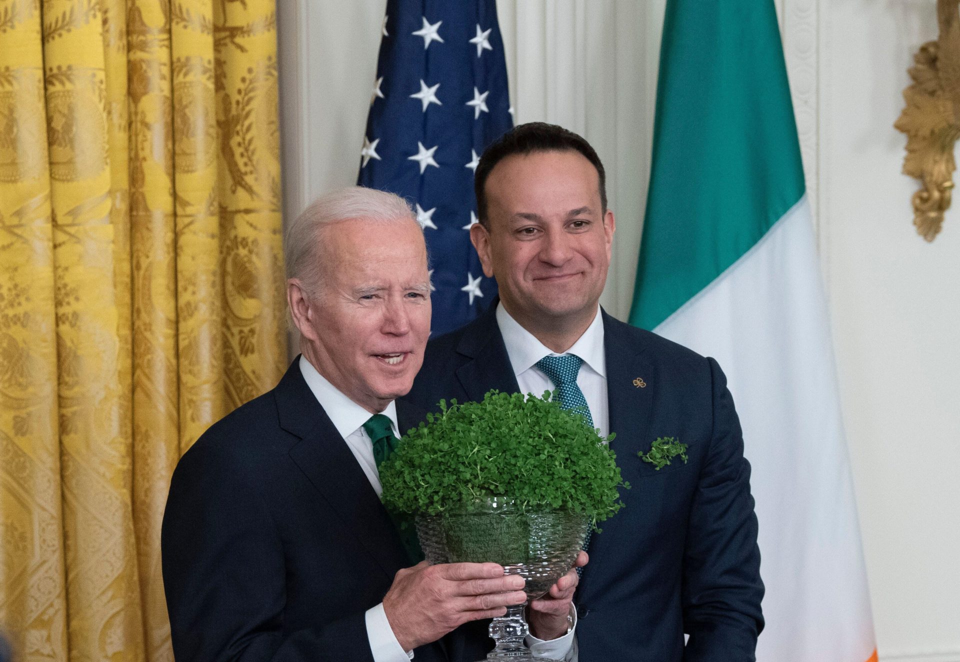 Taoiseach Leo Varadkar presents US President Joe Biden with a bowl shamrocks during a St Patrick's Day reception at the White House, 17-3-23