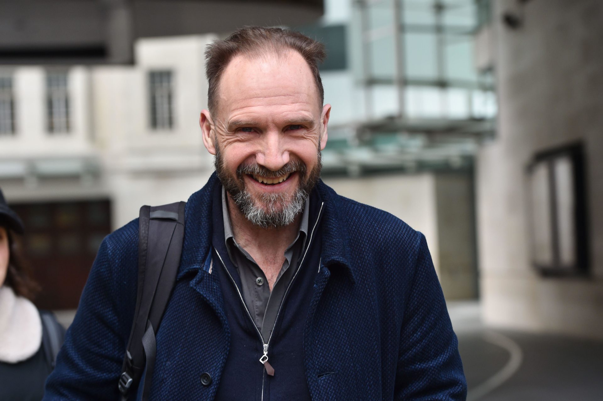 Actor and film producer Ralph Fiennes walking out of the BBC Studios after his appearance on Sunday With Laura Kuenssberg