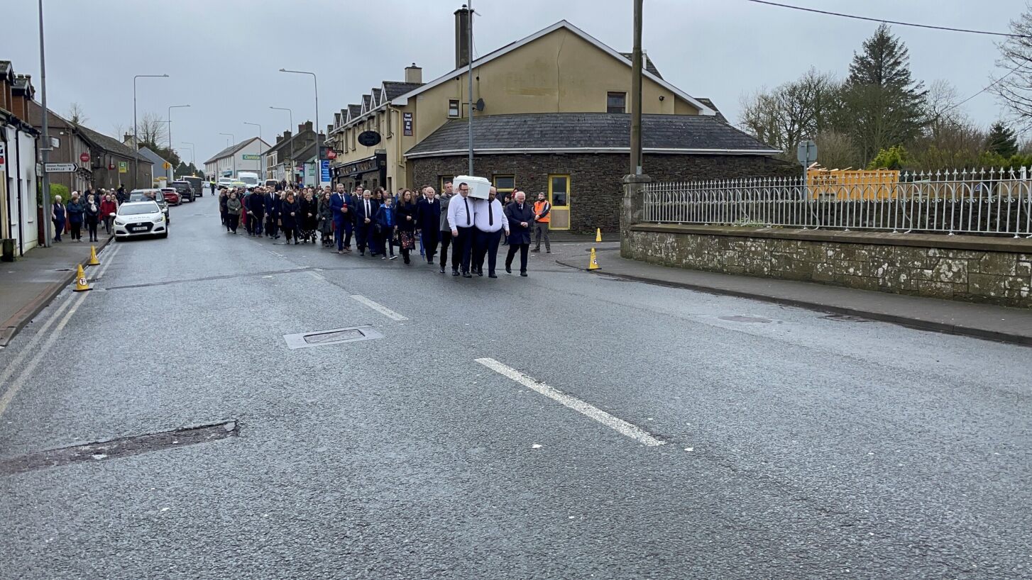 Mourners carry Matthew Healy's coffin into the Church of the Immaculate Conception in Watergrasshill, Co Cork, 14-2-24