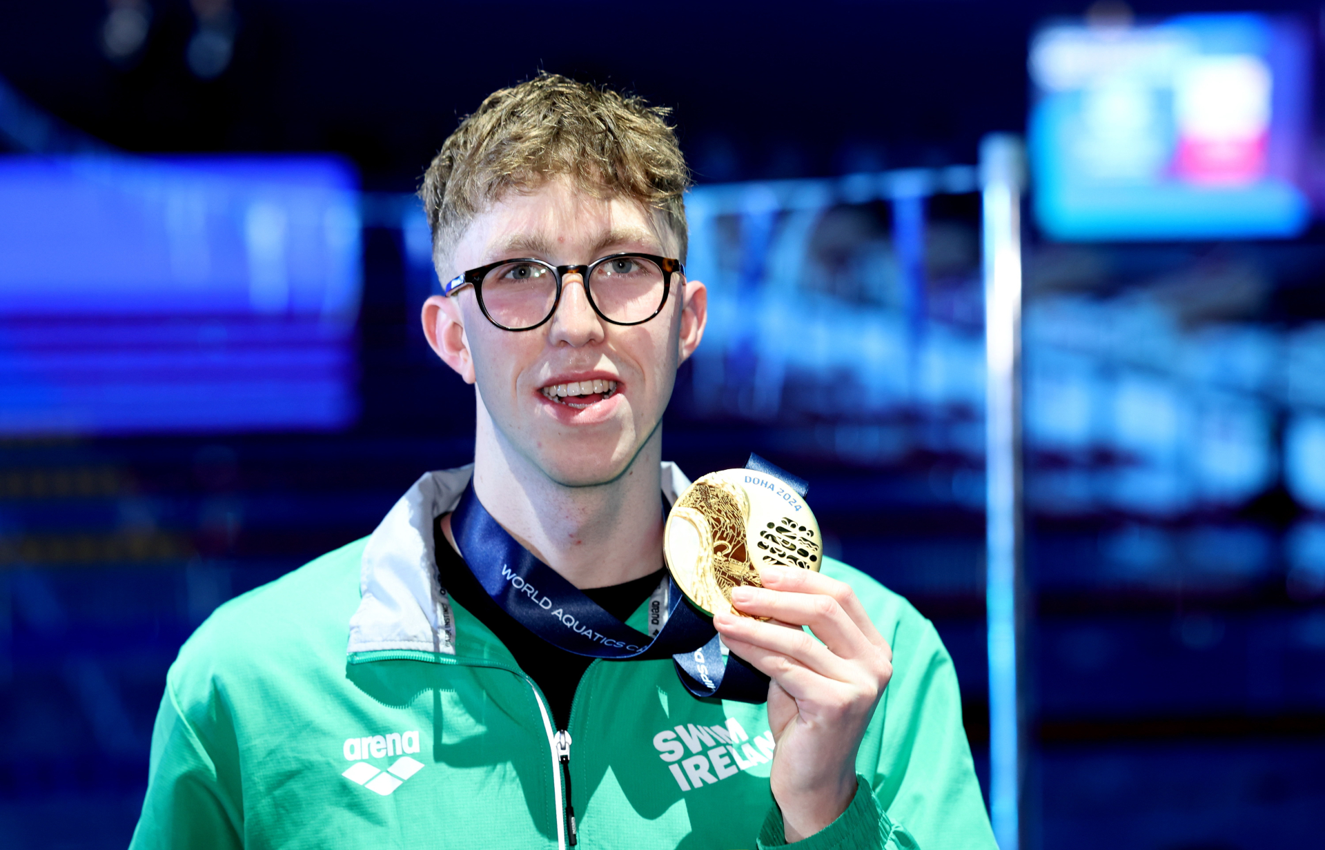 Daniel Wiffen of Ireland with his gold medal after winning the Men's 1500m freestyle