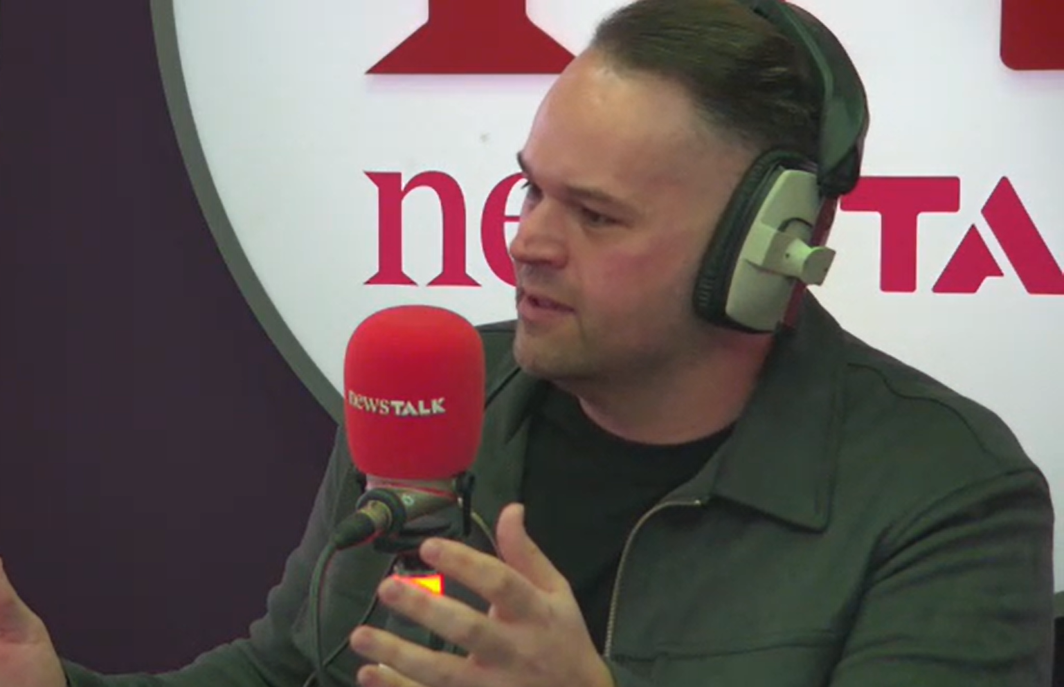 Radio presenter Karl Dawson speaking on Lunchtime Live. 