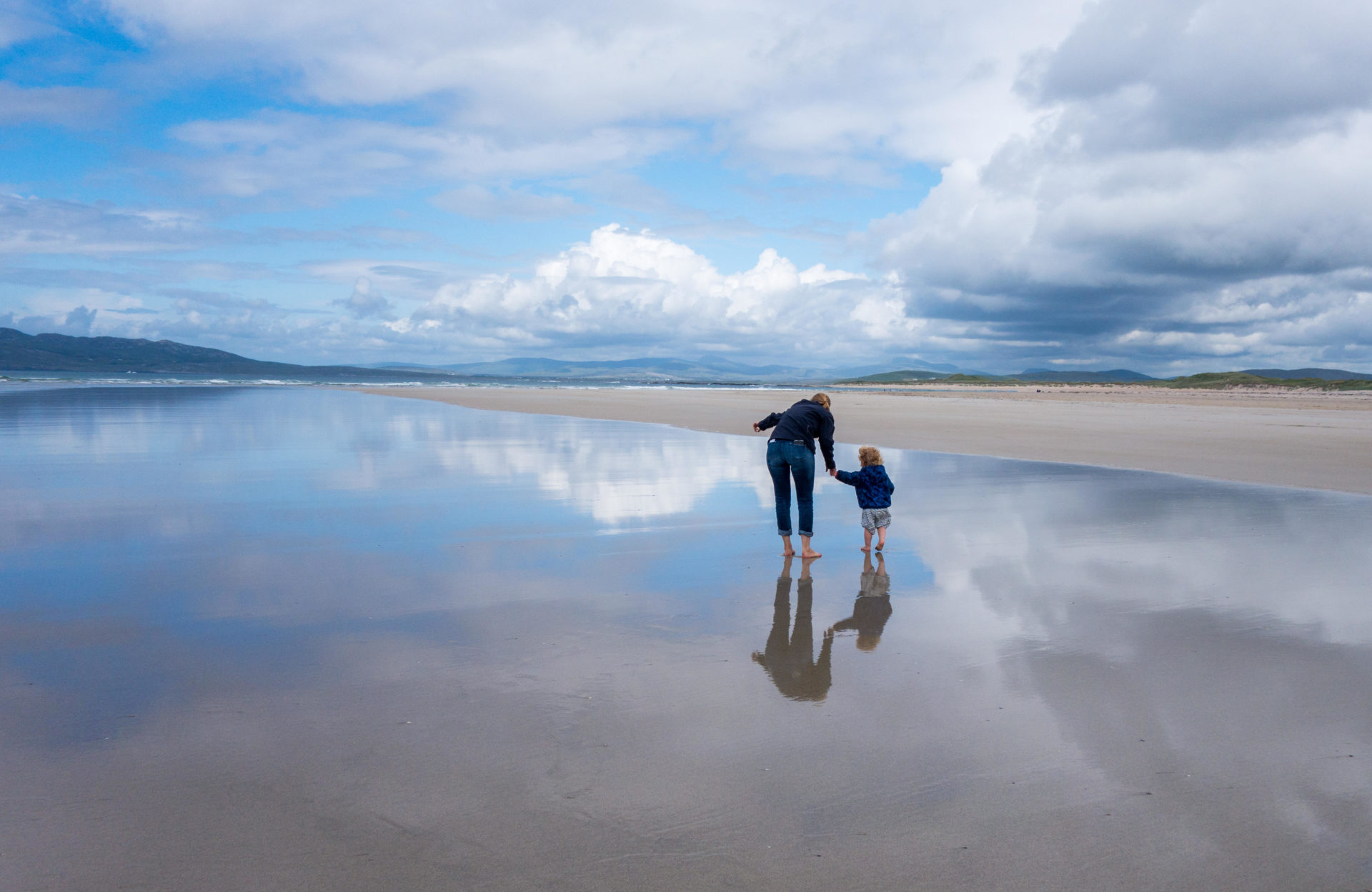 Mother and daughter walking on Narin Beach, Portnoo, County Donegal Ireland.