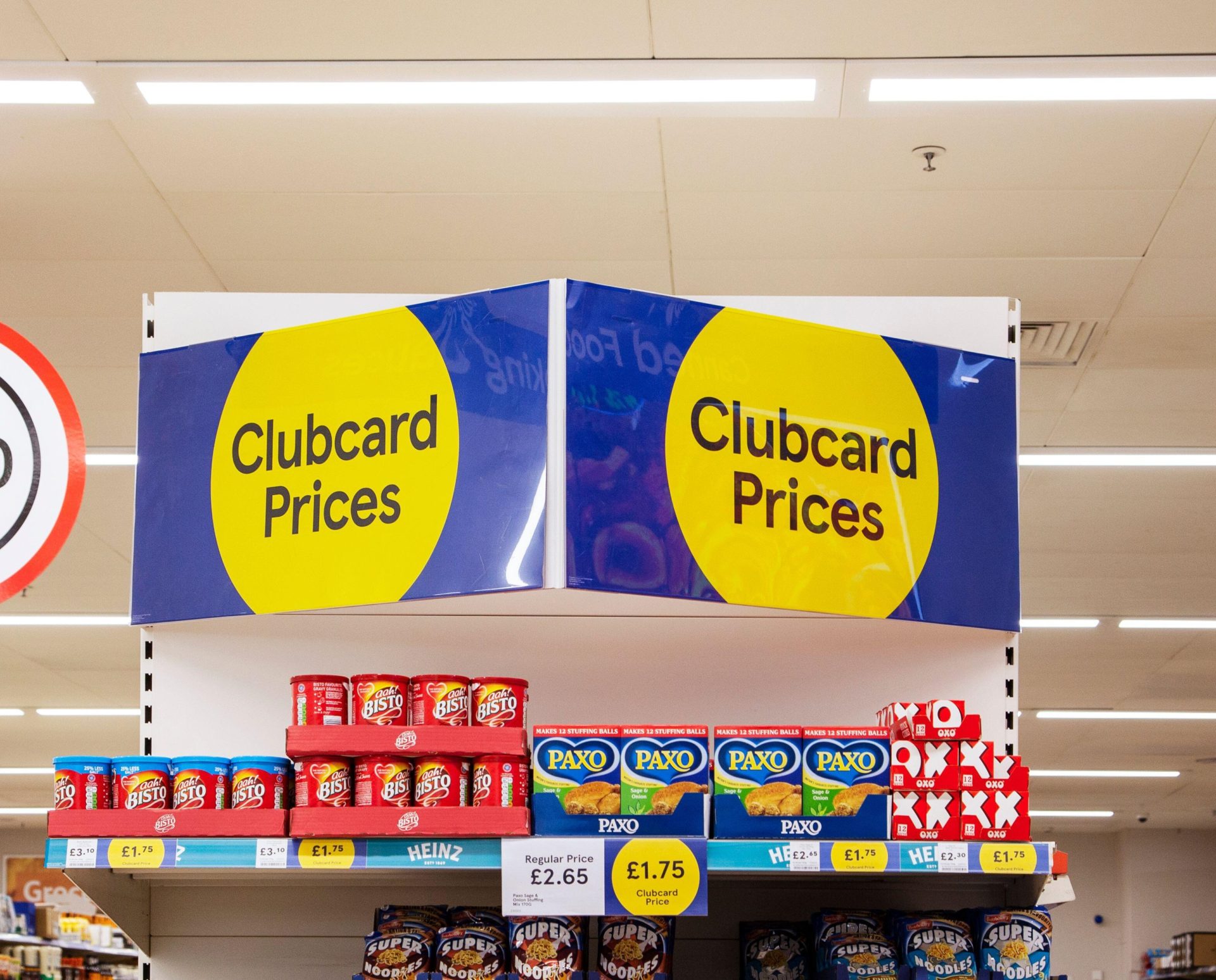 A sign for Tesco Clubcard prices, 30-9-23