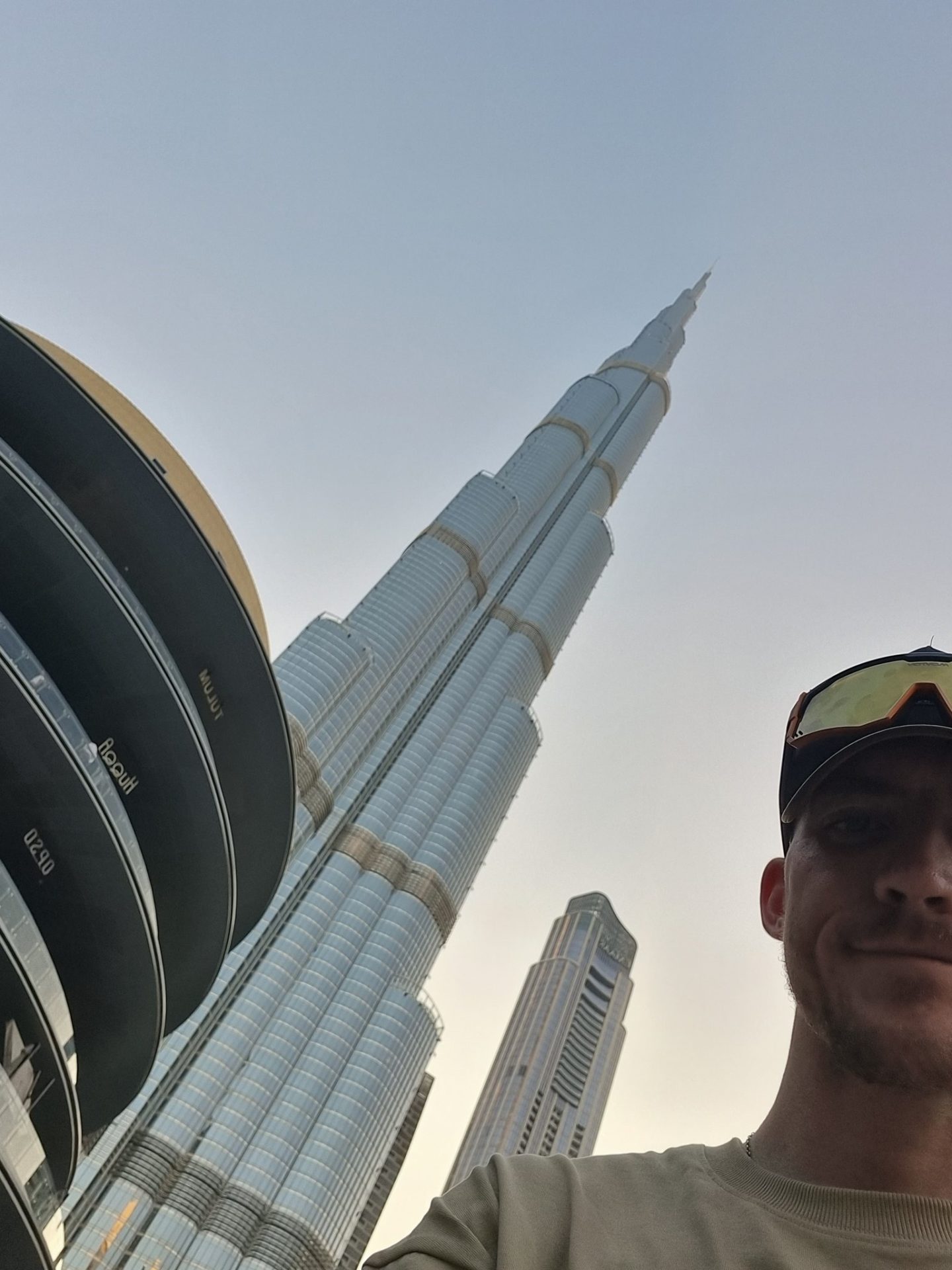 Tomás Mac an t-Saoir beside the Burj Khalifa skyscraper in Dubai