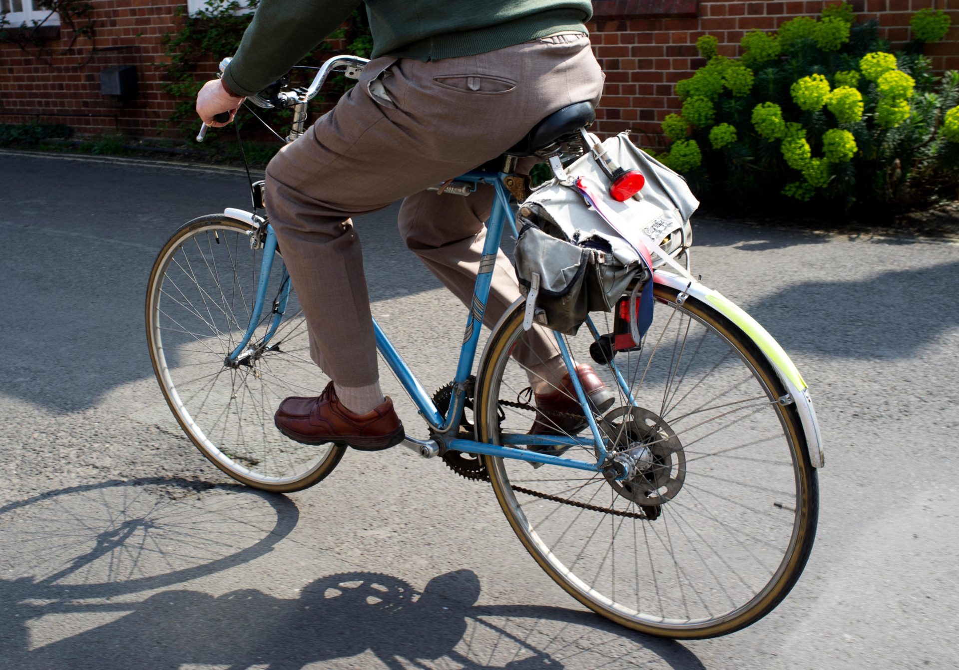 An older man cycling a bike, 9-4-15.