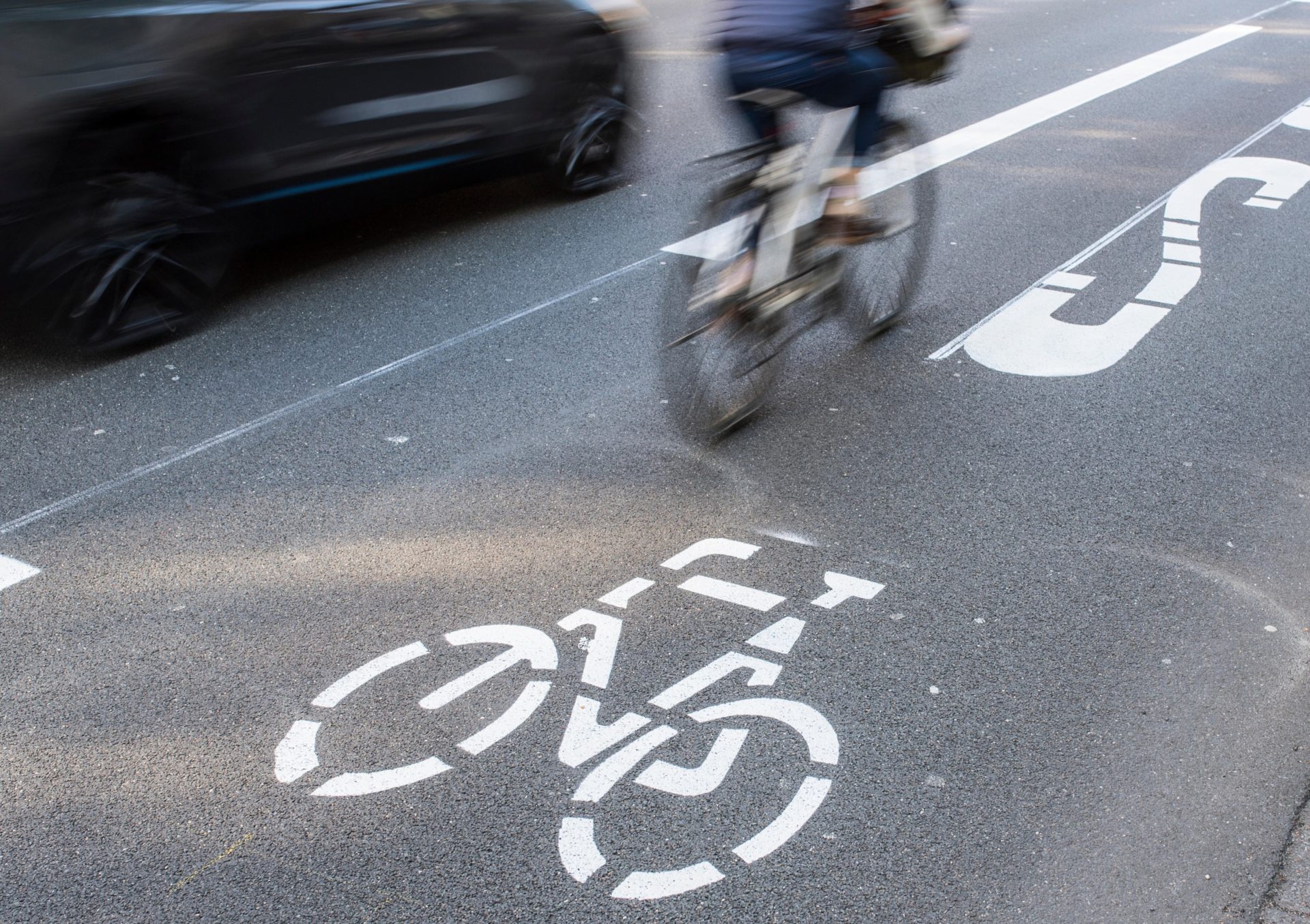 A person cycling in a bike lane, 16-4-19.